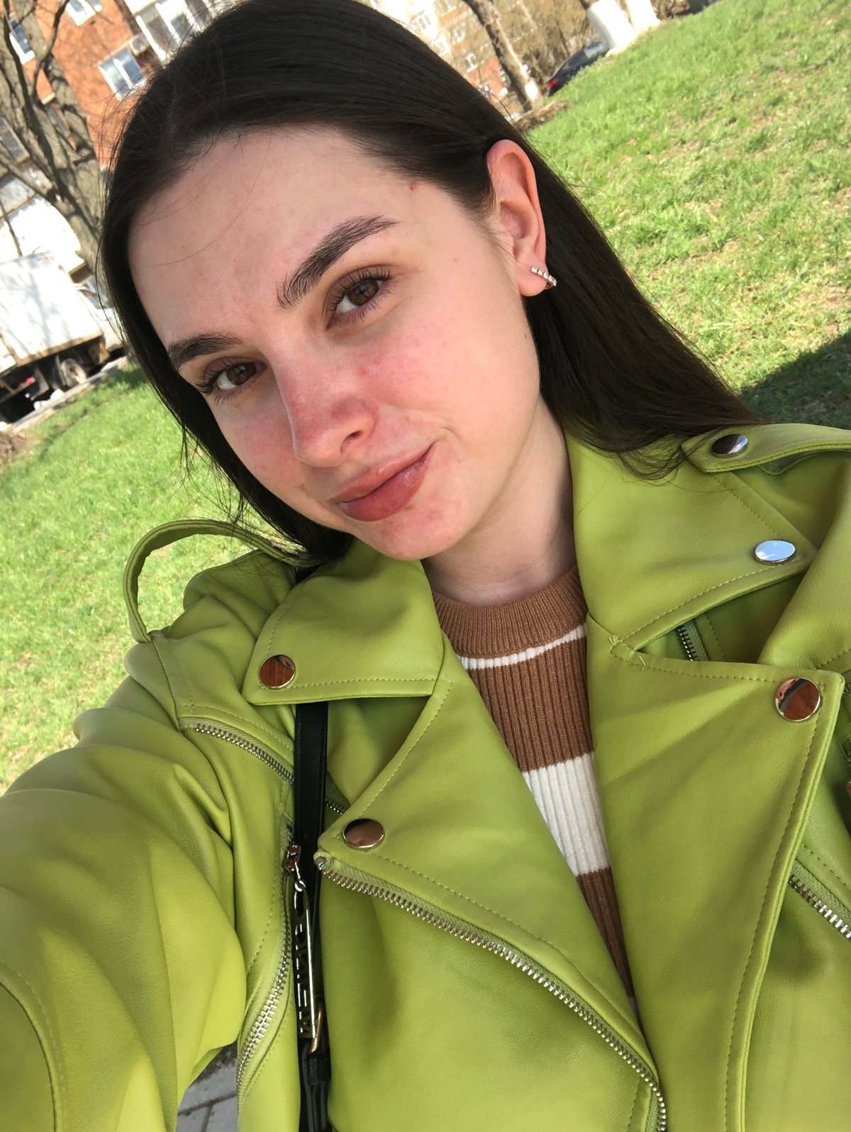 Woman documents sunny park visit in Votkinsk, Russia