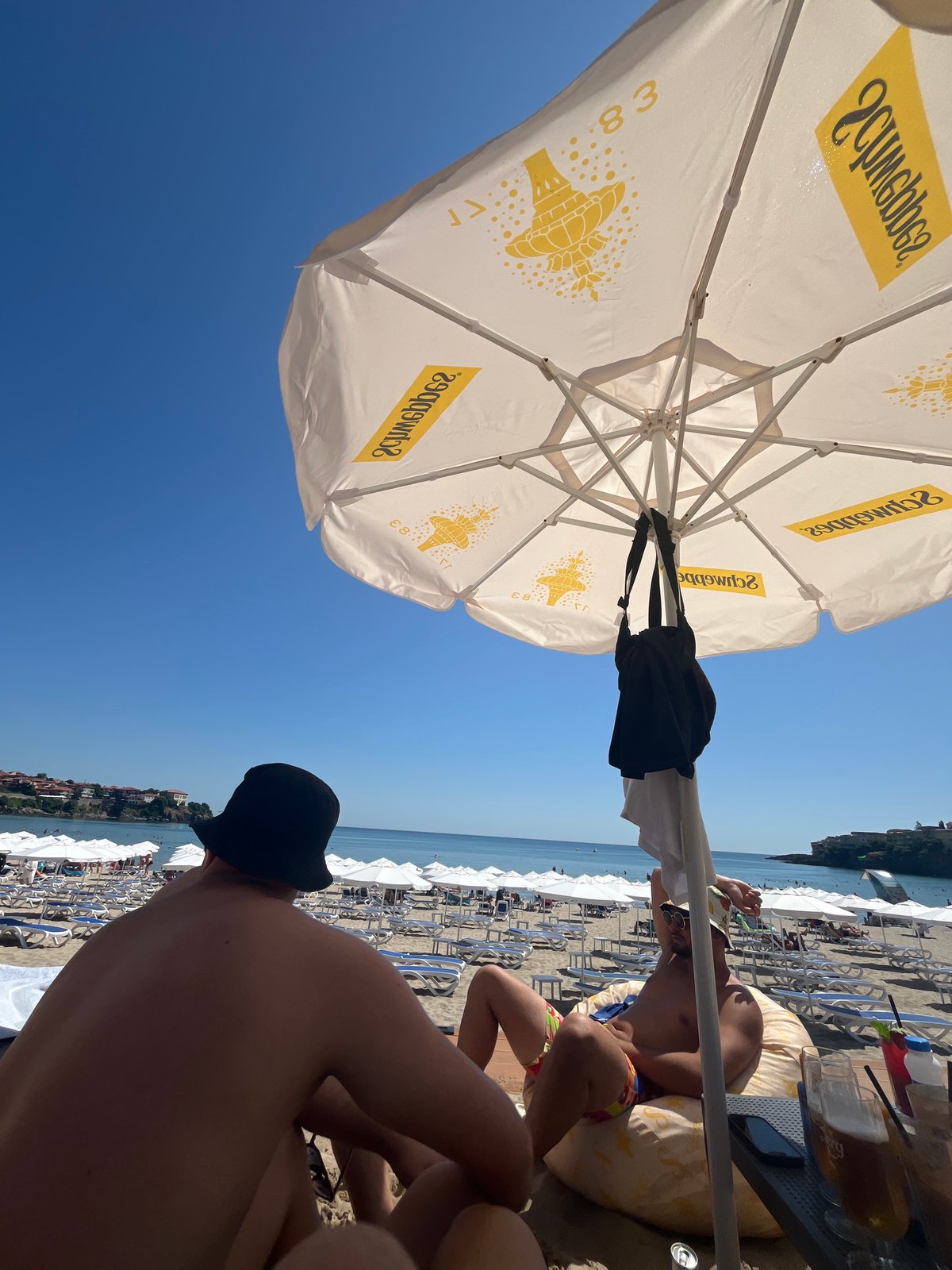 Relaxing under a beach umbrella in Sozopol, Bulgaria