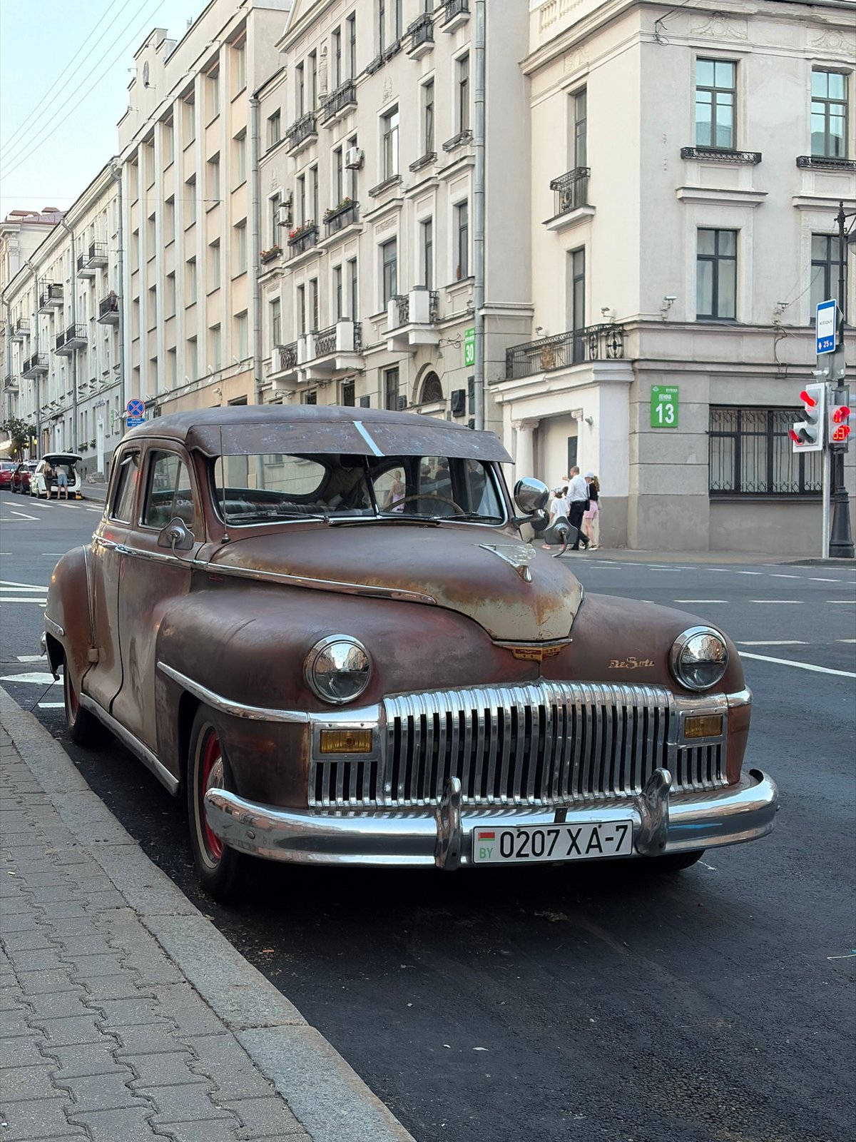 Minsk landmarks, vintage cars, and street life at golden hour