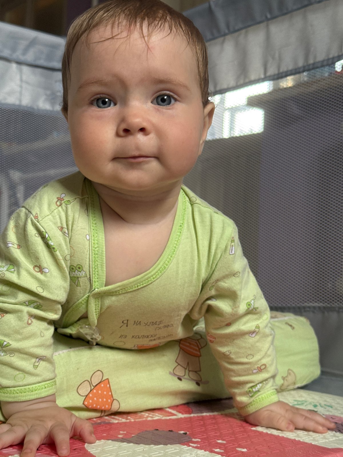 Baby observed in playpen in Rusalevka, Russia