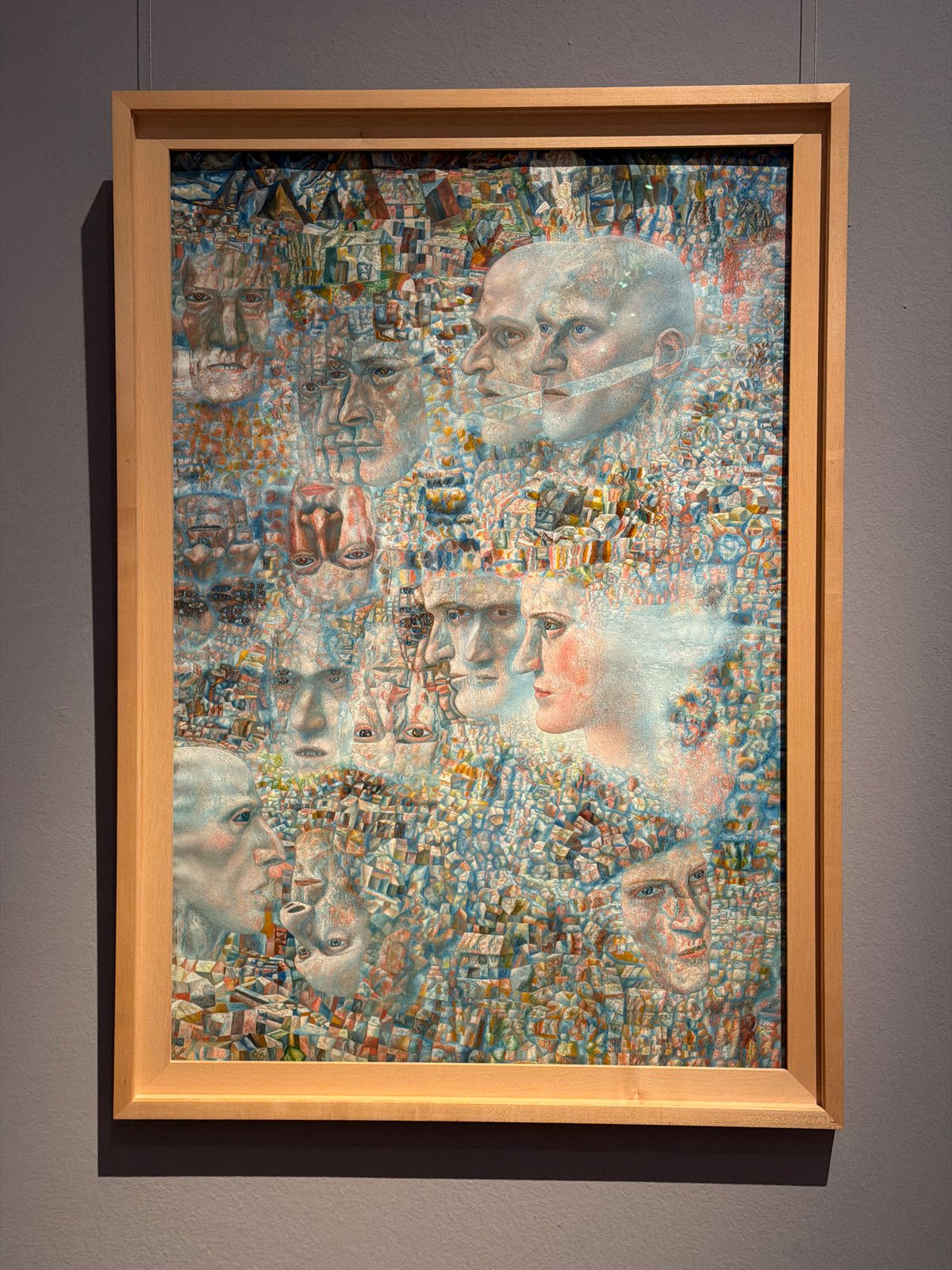 Abstract portrait artwork displayed on wall in Malakhovka
