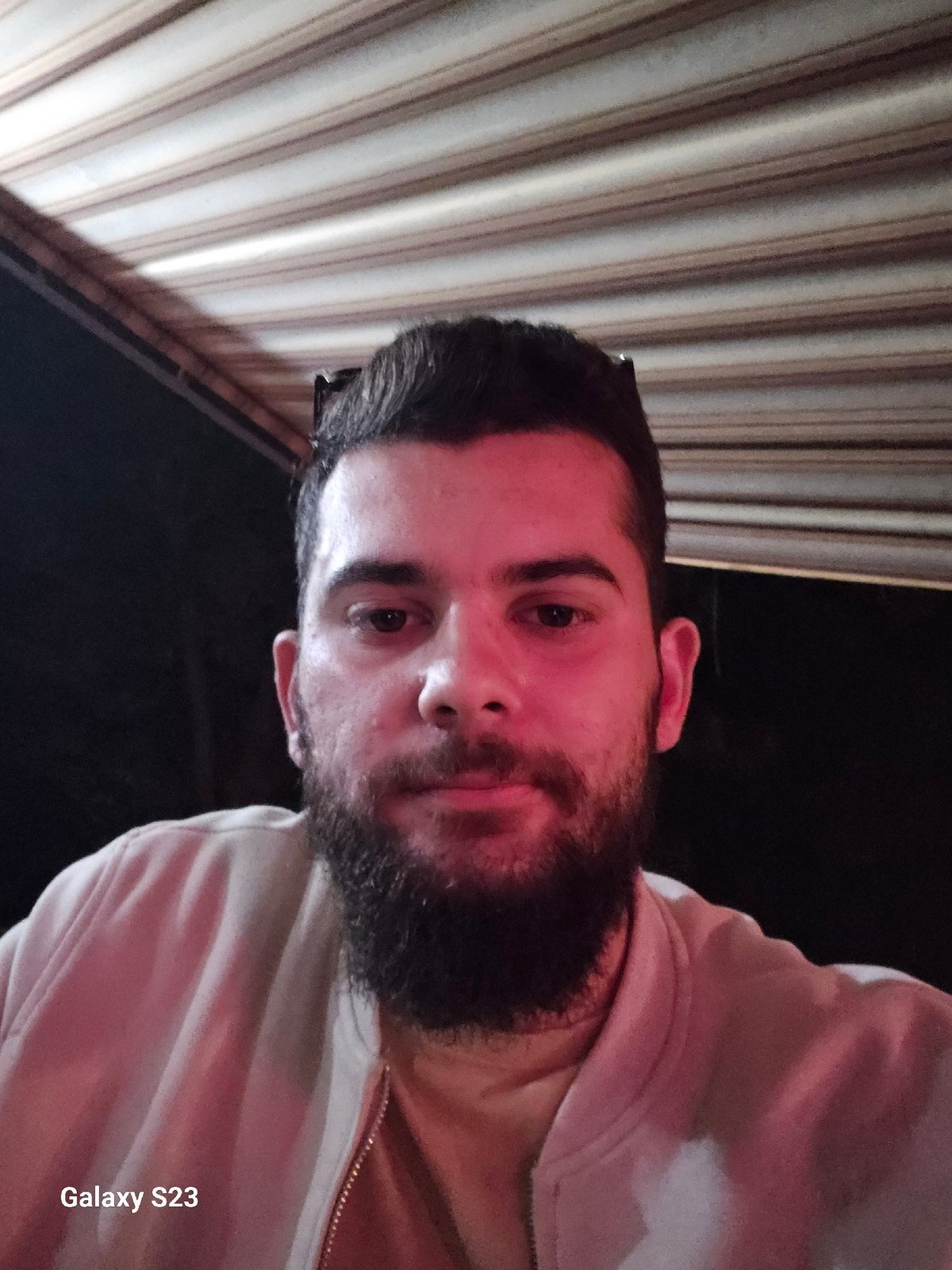 Concert-goer documents outdoor music event with selfies, beer in Sliven