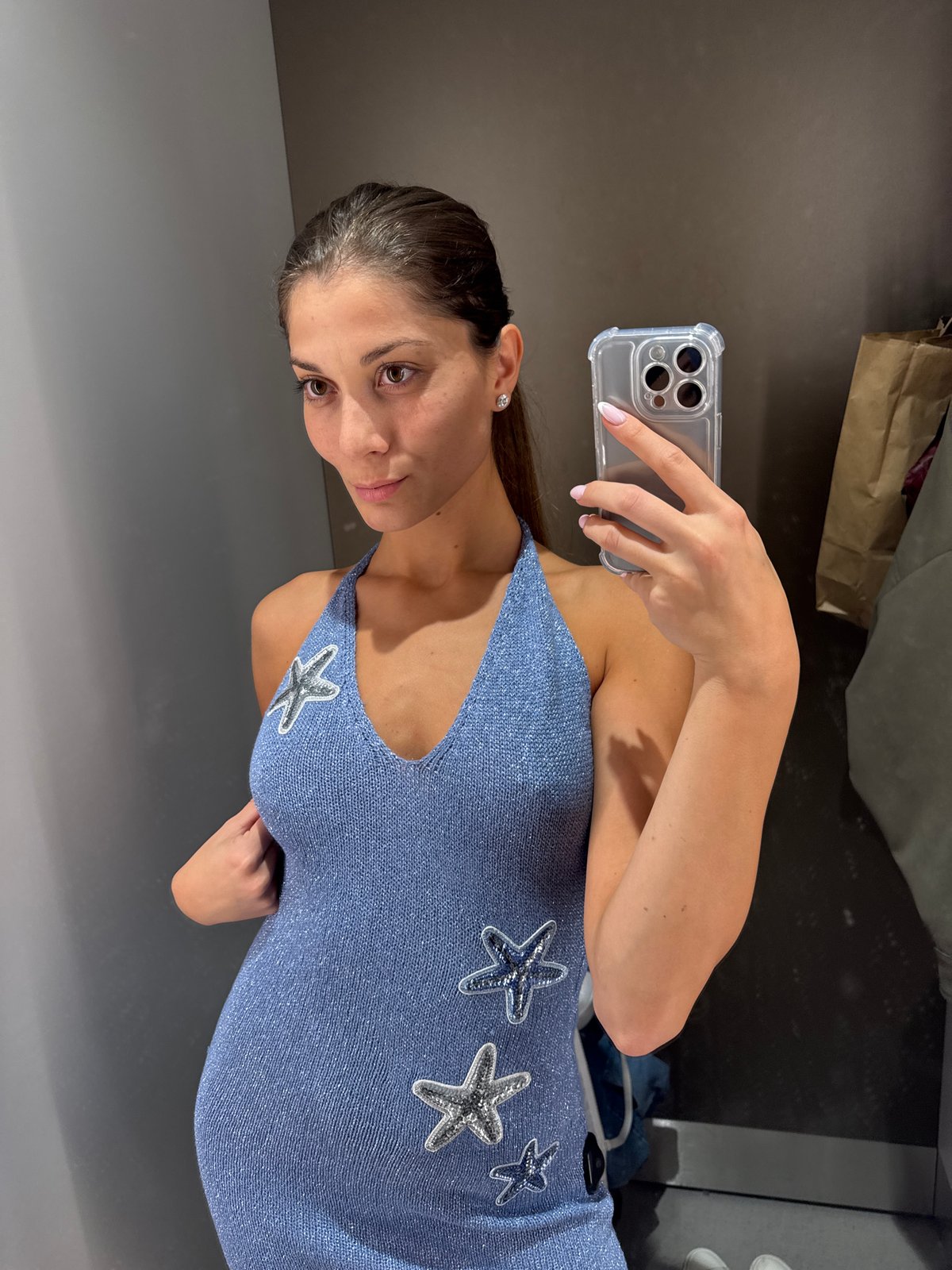Woman takes fitting room selfies in Burgas retail store