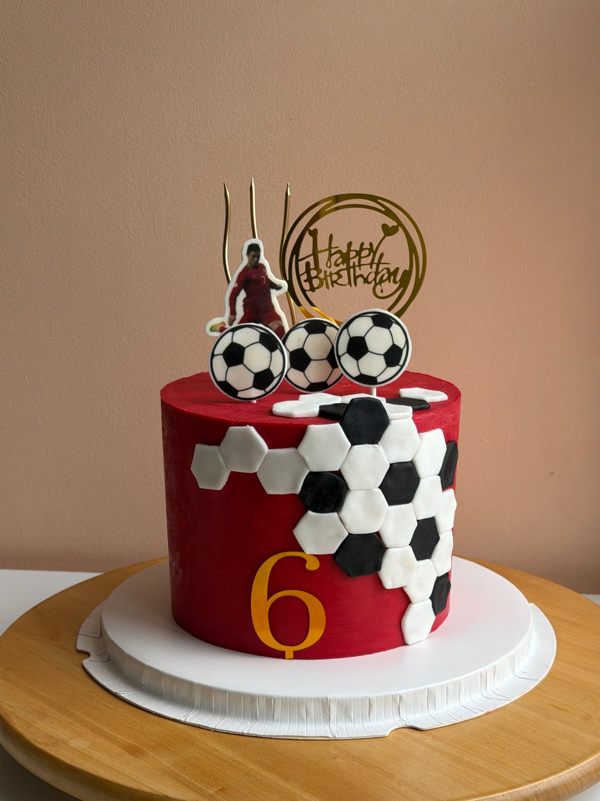 Birthday celebration with soccer cake and pets in Tel-Aviv apartment