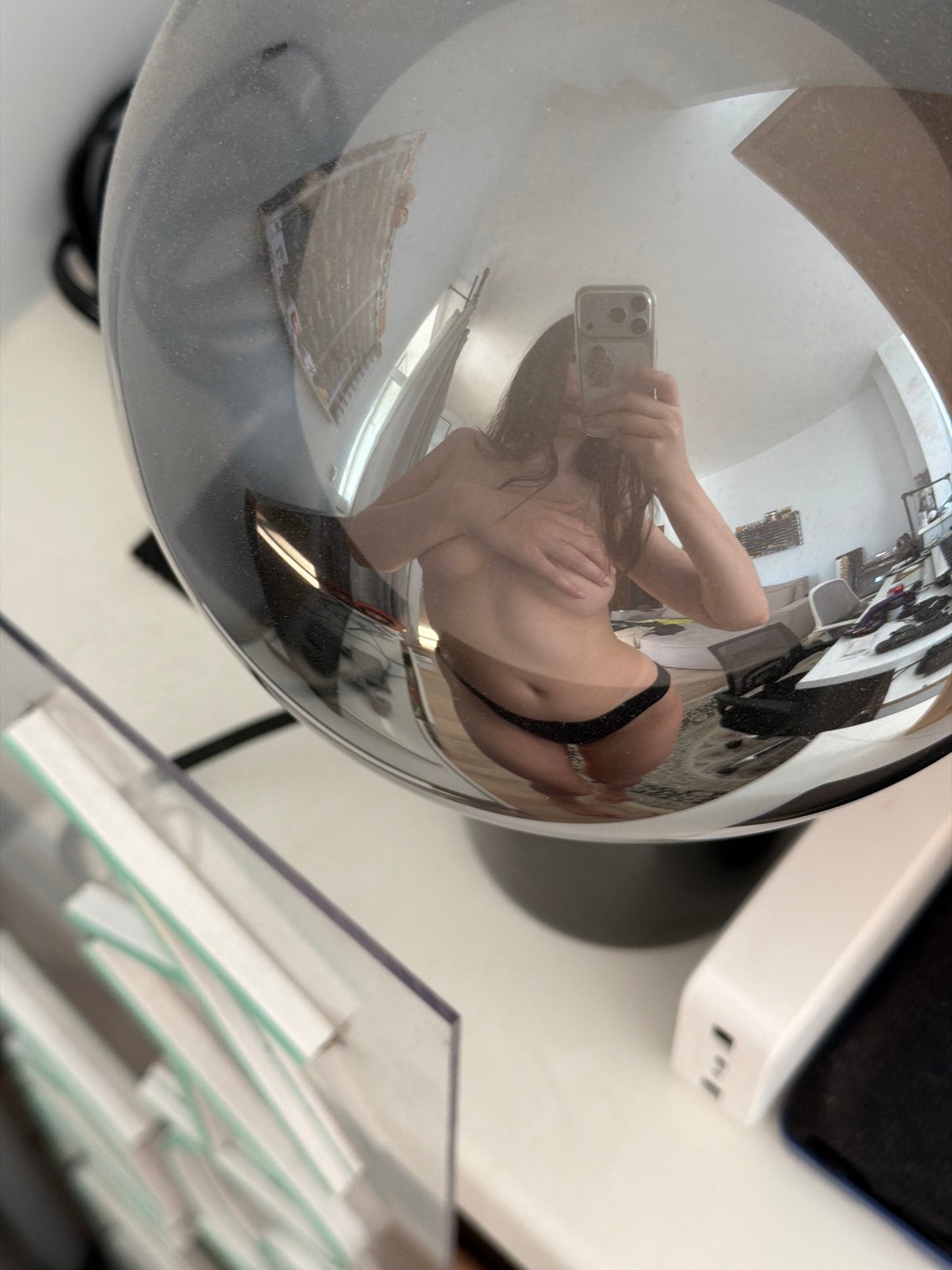 Outdoor selfies in Khimki, one caught in a mirrored sphere