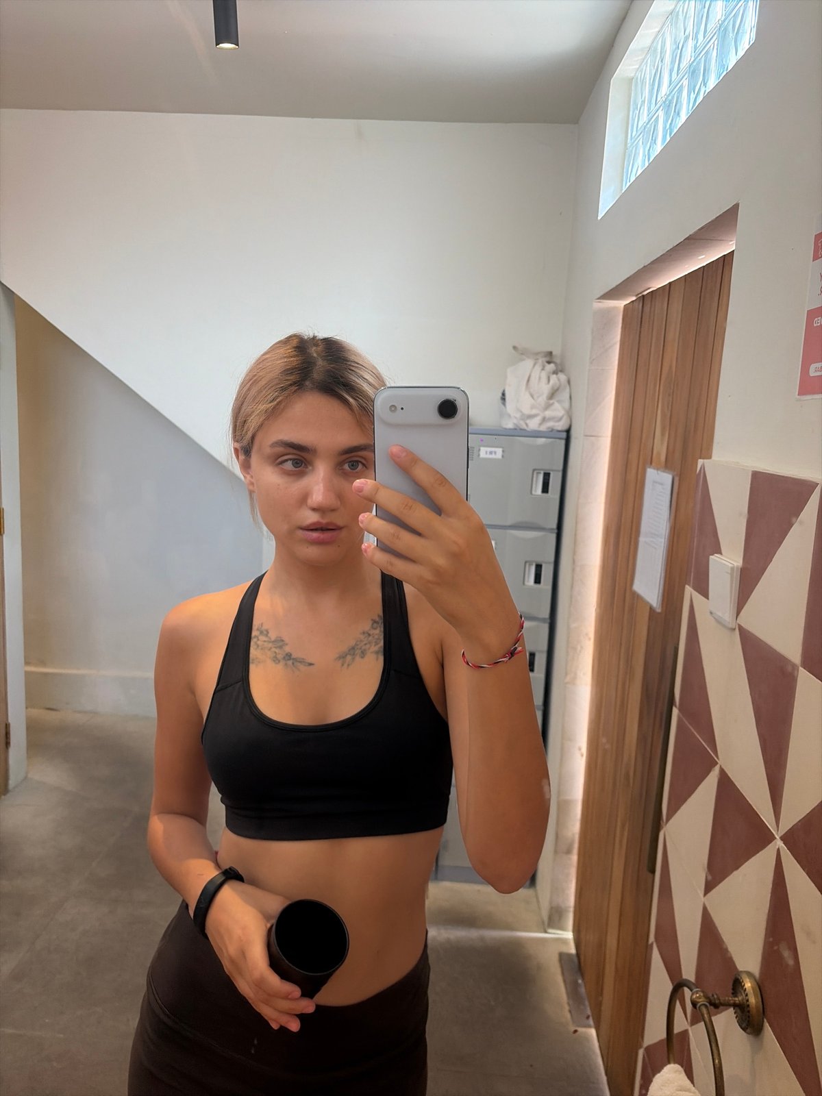Workout mirror selfie and stone Buddha statue, North Kuta Bali