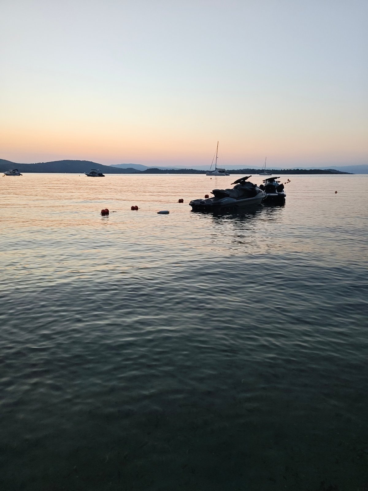 Quiet evening on the Sithonian coast, boats at anchor