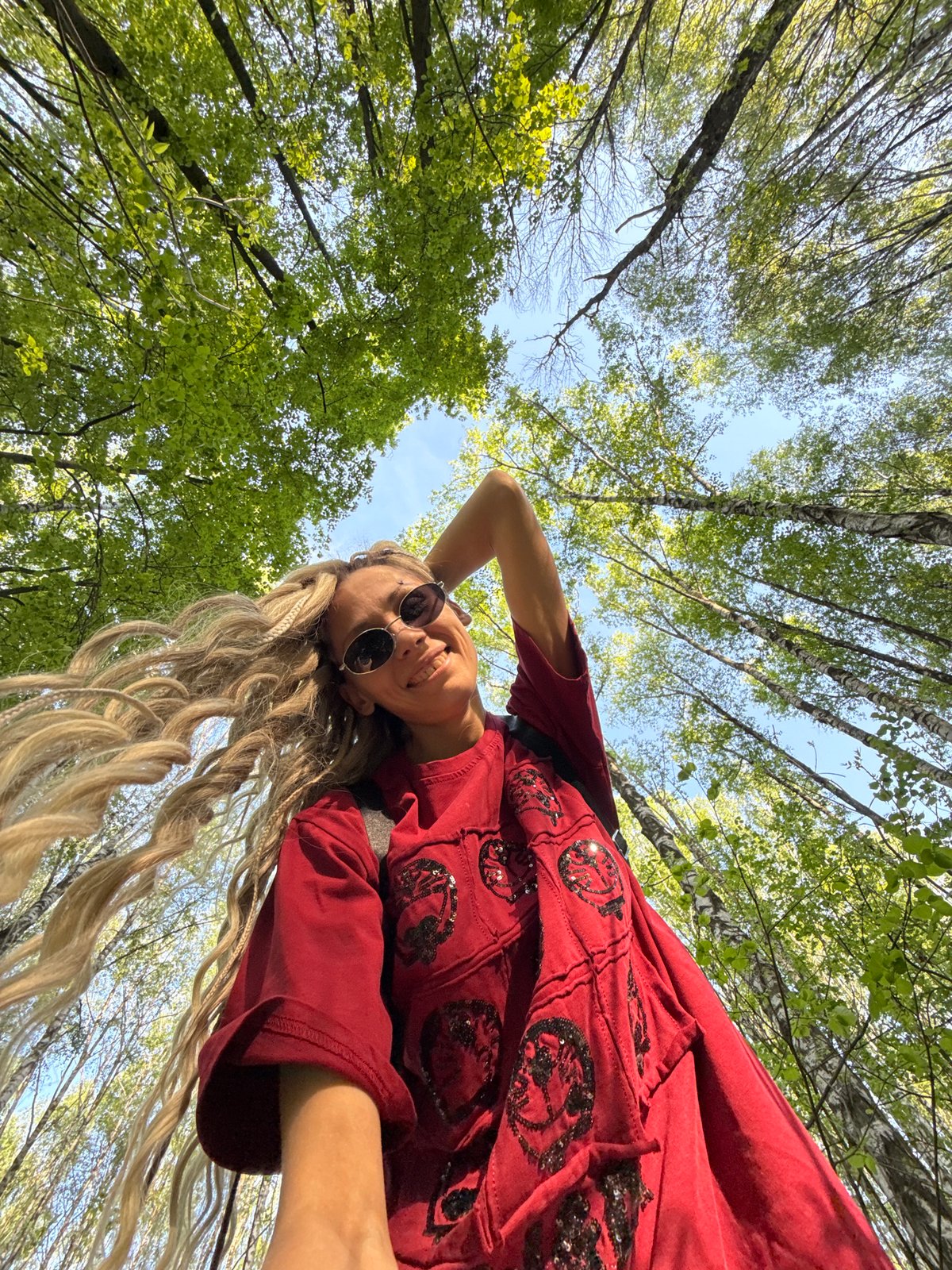 Woman poses for forest portrait in Шебунино, Russia