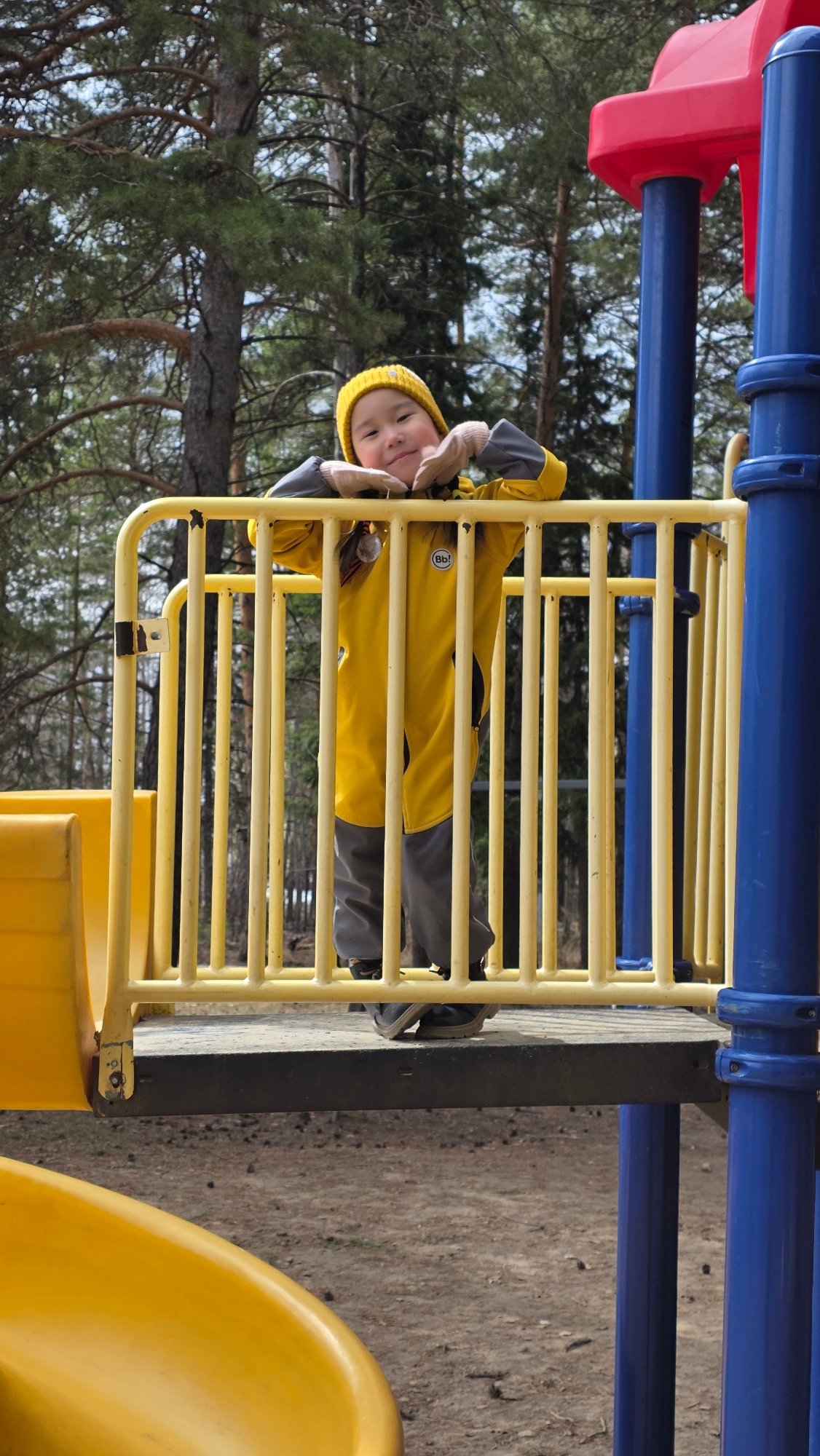 Child plays at playground, memorial complex documented in Lensk