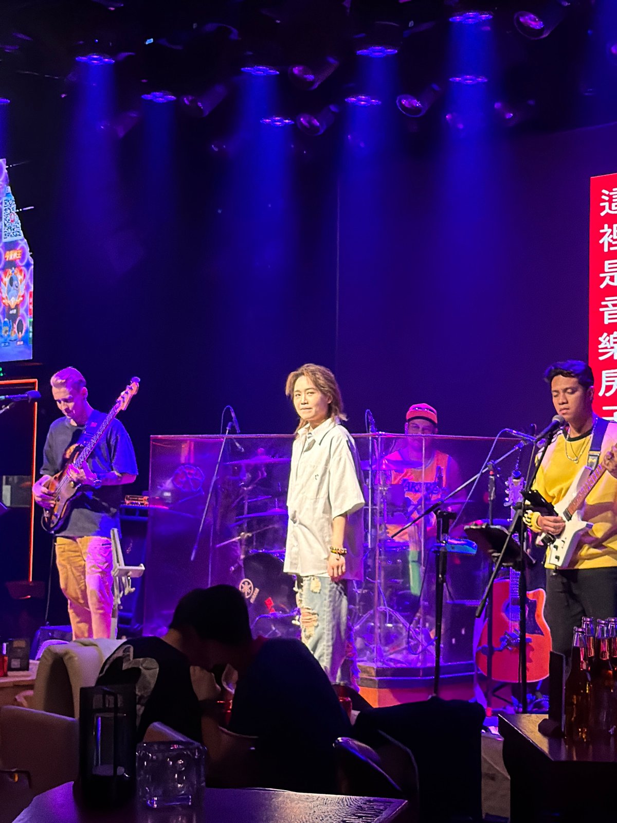 Live band performs with colorful lighting in Jiangbei, China