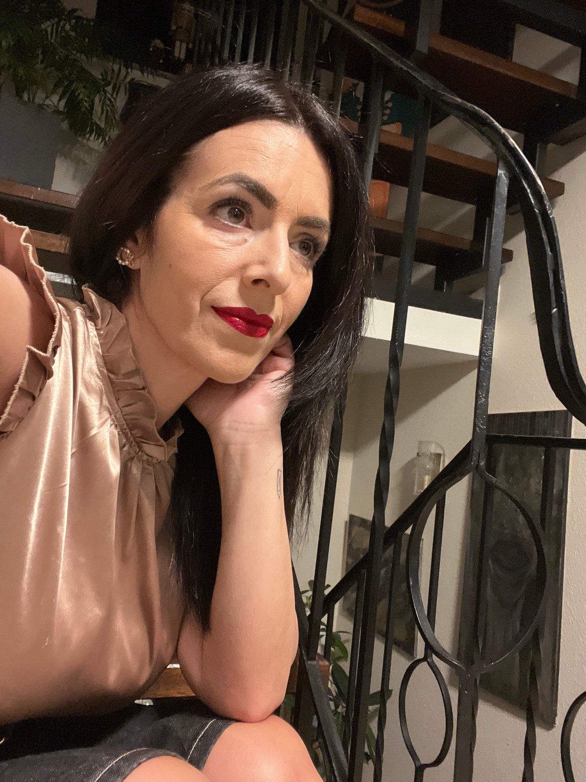 Woman photographed in multiple indoor poses in Konz residence