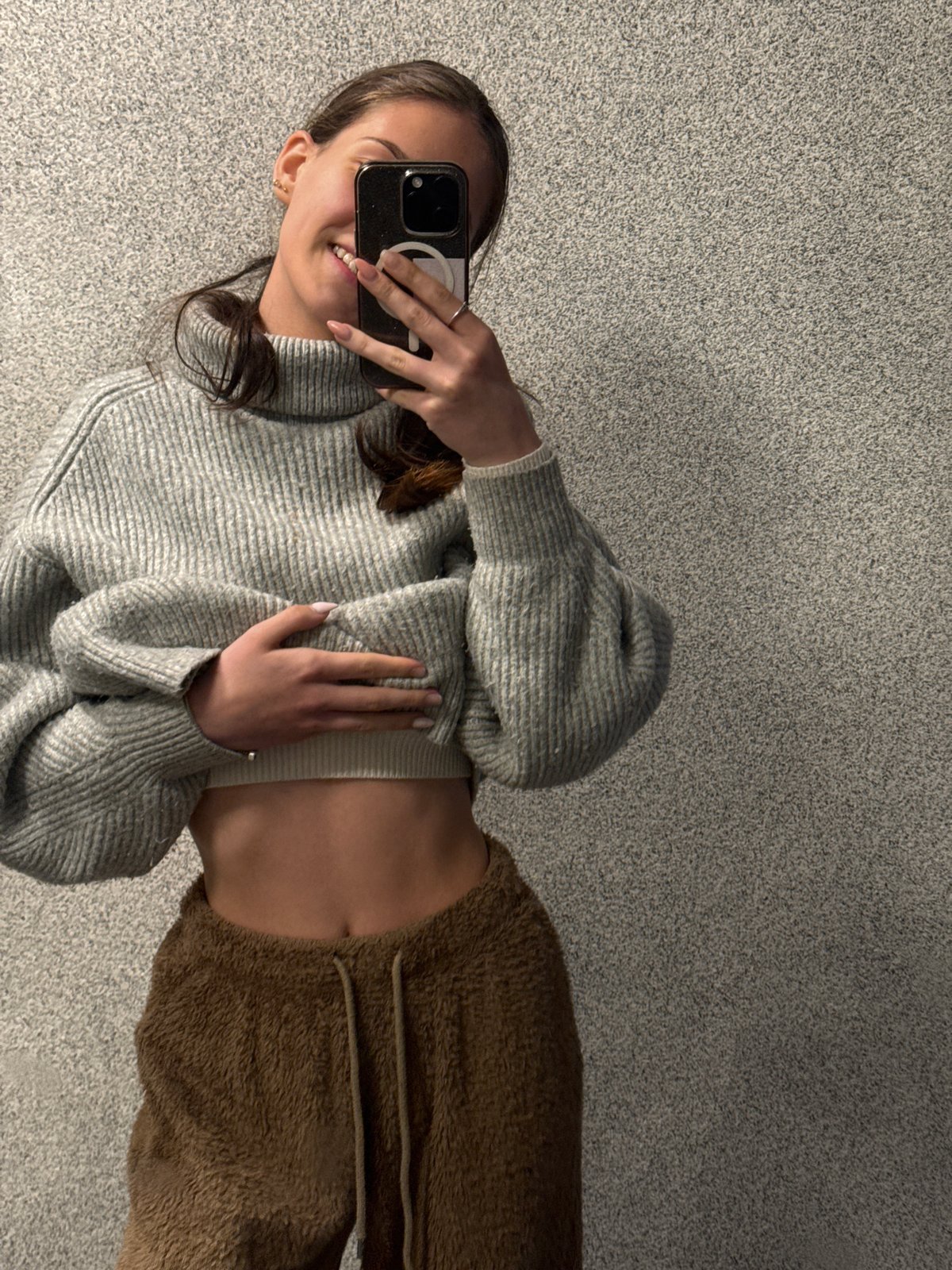 Woman photographed taking selfies, relaxing indoors in Sofia