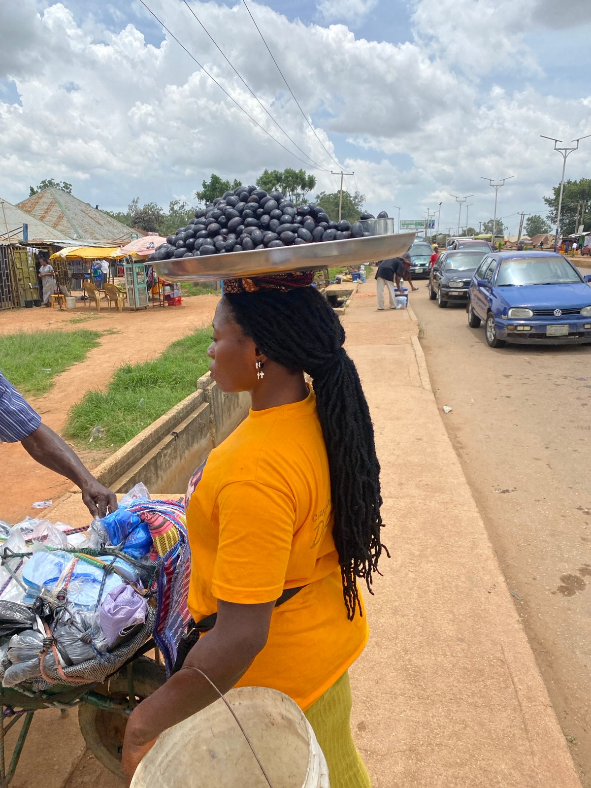 Street life and everyday movement in Bukuru, Nigeria