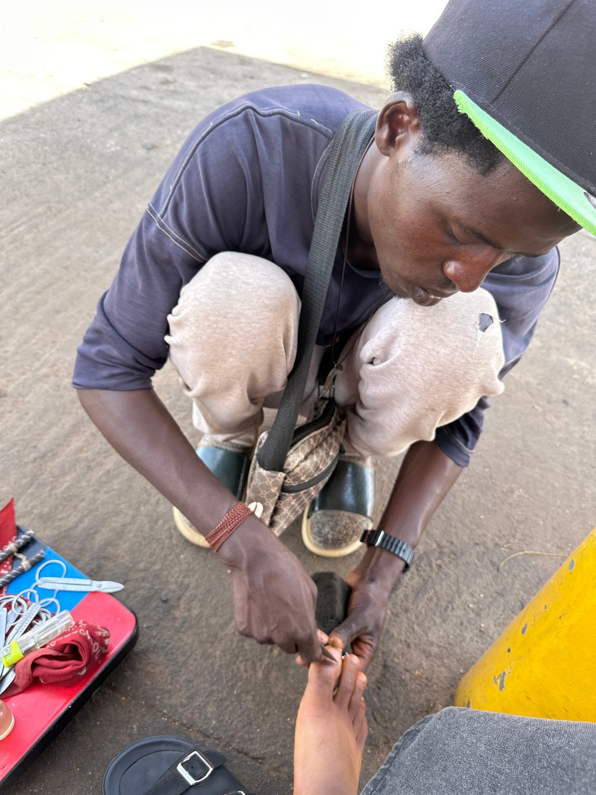 Street pedicure services documented in Jos, Nigeria