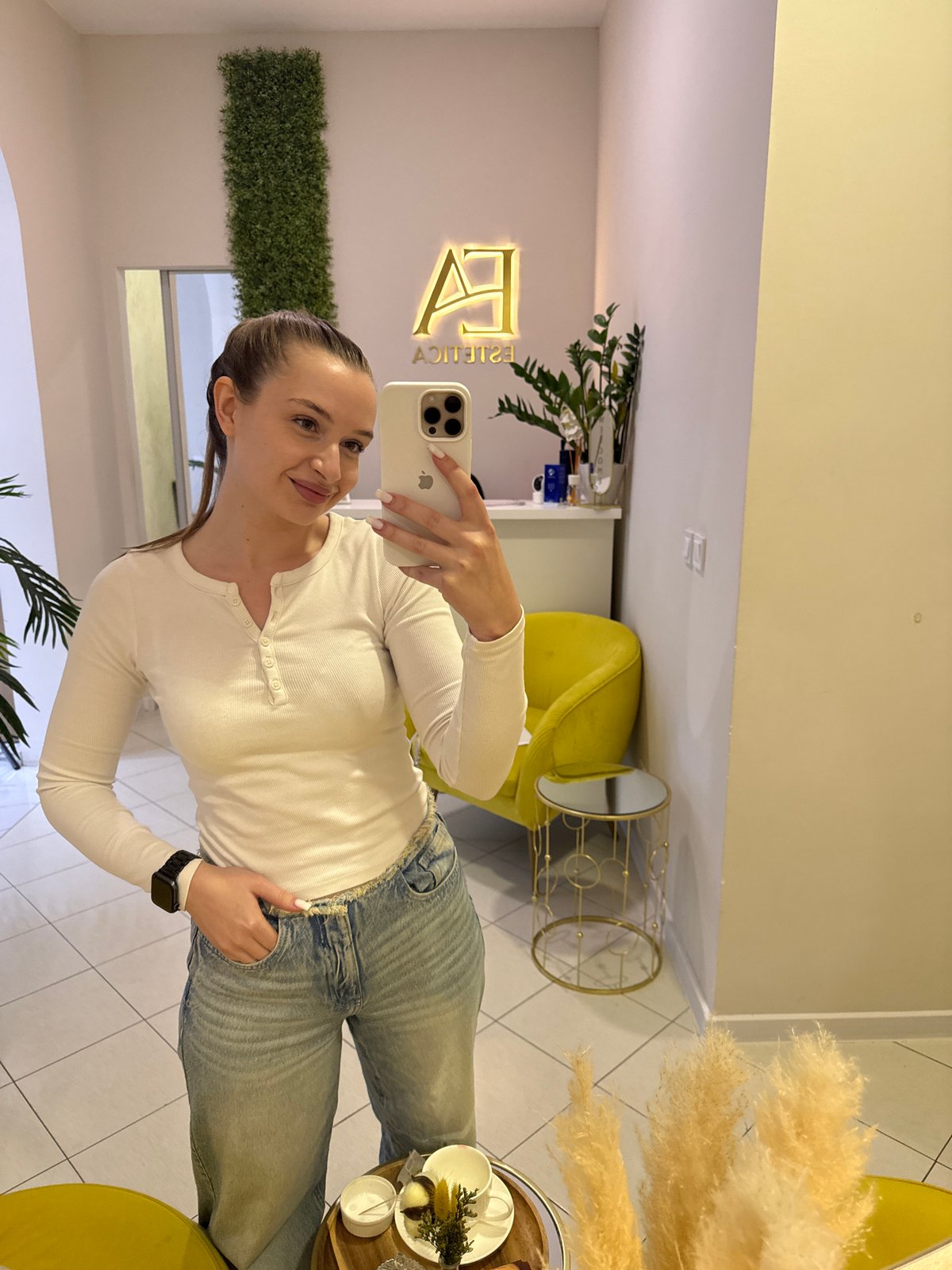 Woman photographs herself at aesthetic clinic in Budva