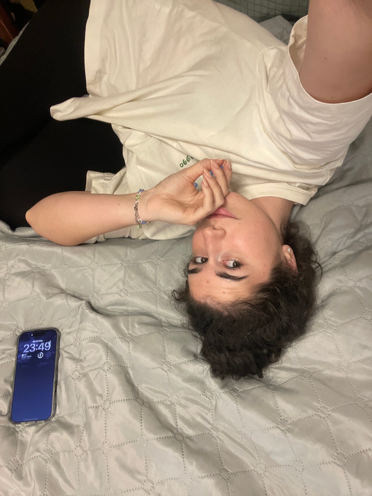 Woman and dog share quiet evening moments in Sofia bedroom