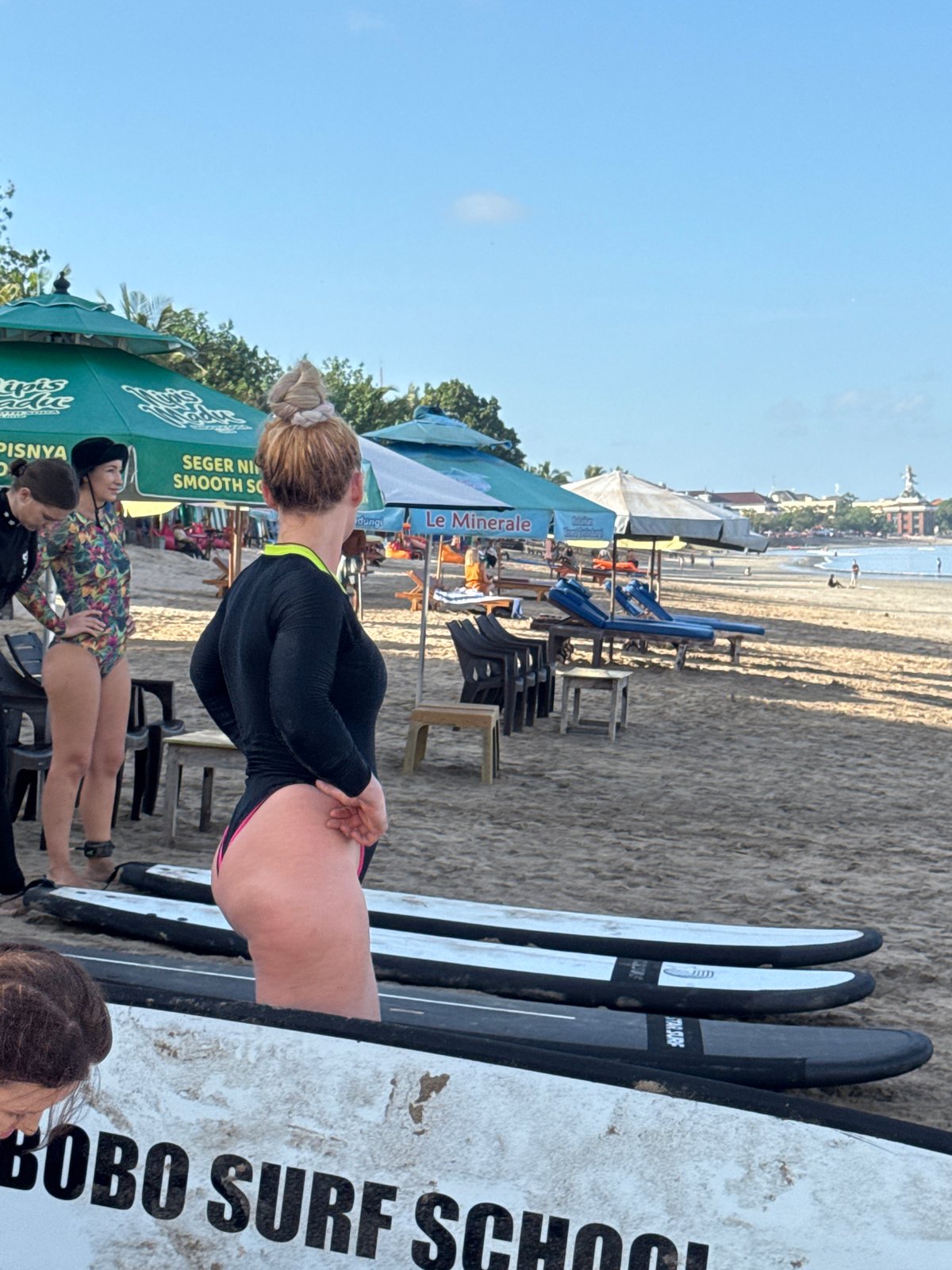 Late-night surf lessons conducted at Kuta Beach, Bali
