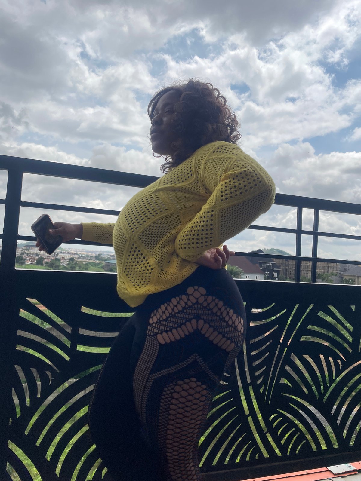 Afternoon hang in Abuja — balcony views, crafts, and city life
