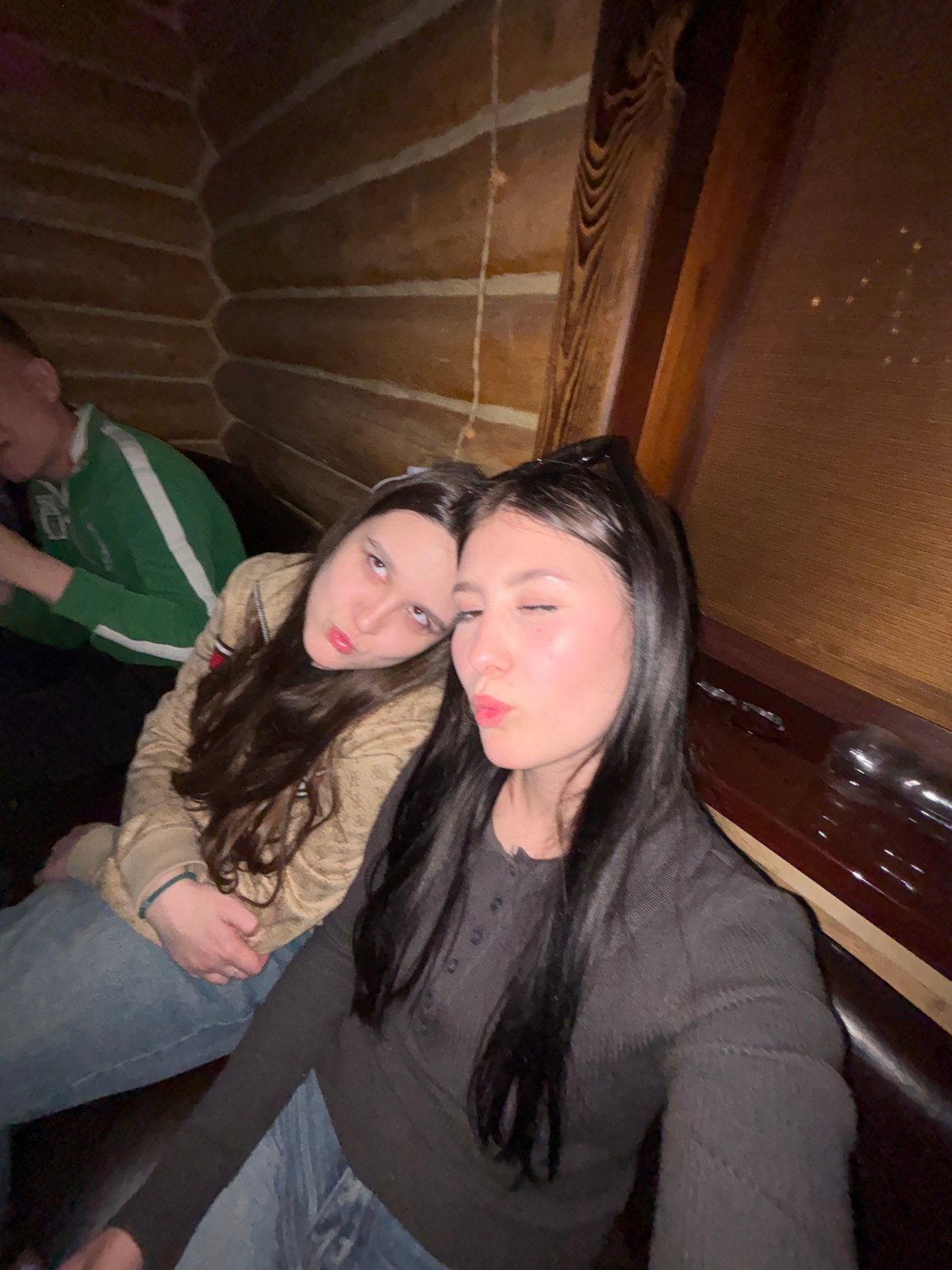 Two women photographed together in Chaikovsky interior space