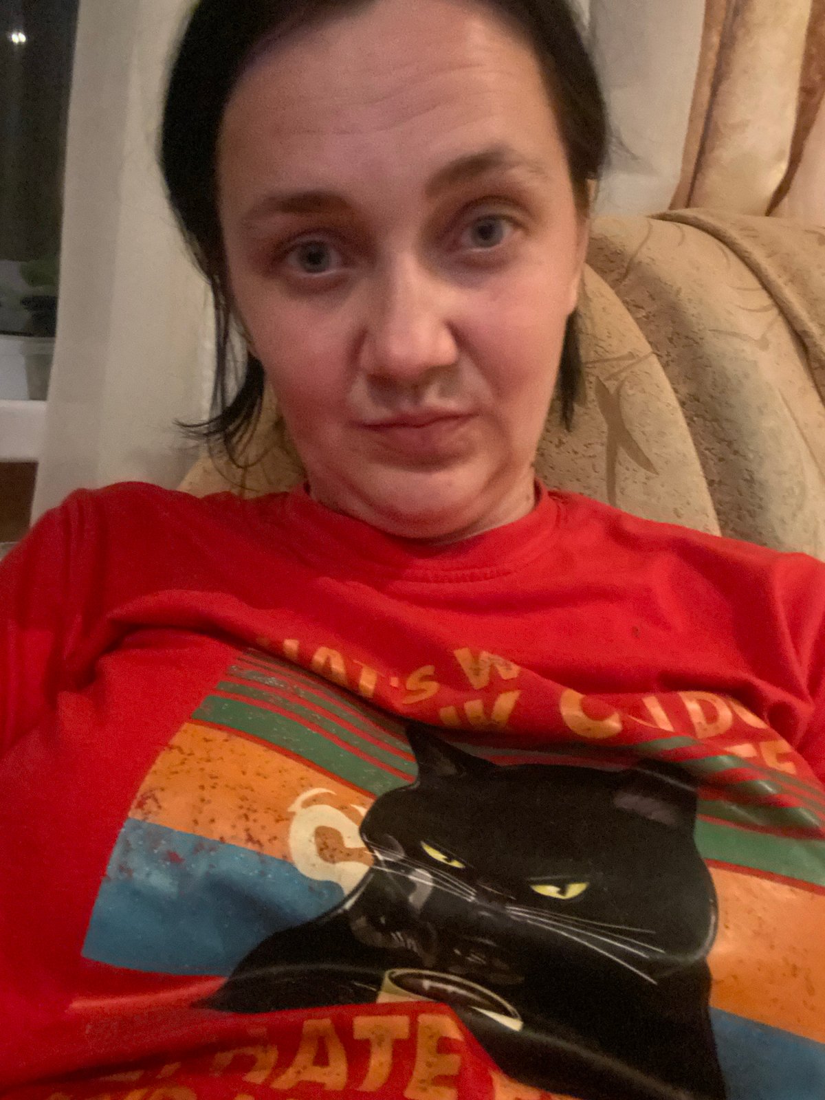 Relaxed home afternoon: cat tee, tiki drinks, and TV news