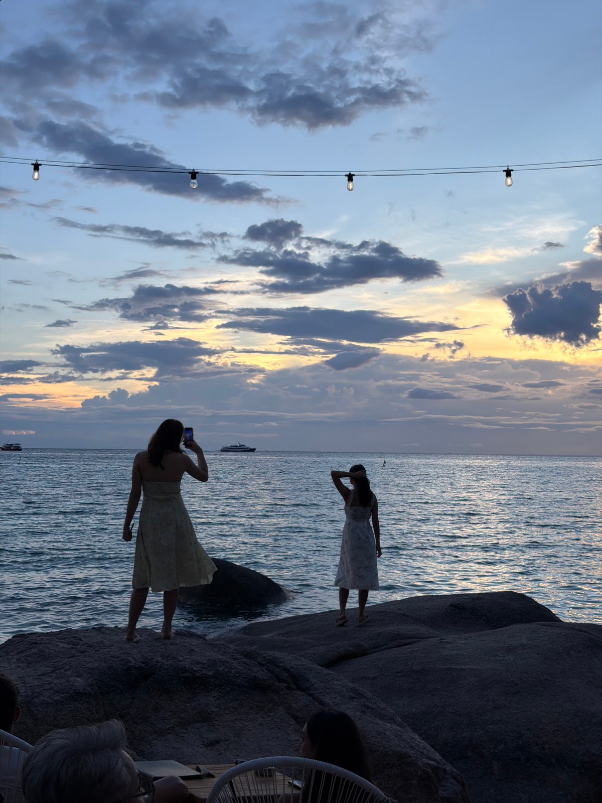 Golden hour on Ko Tao's shores, cafés and calm water
