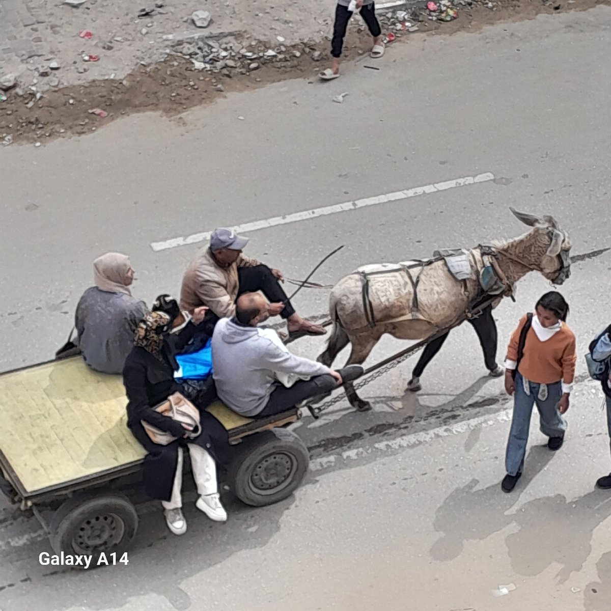 Urban destruction documented alongside continued daily life activities