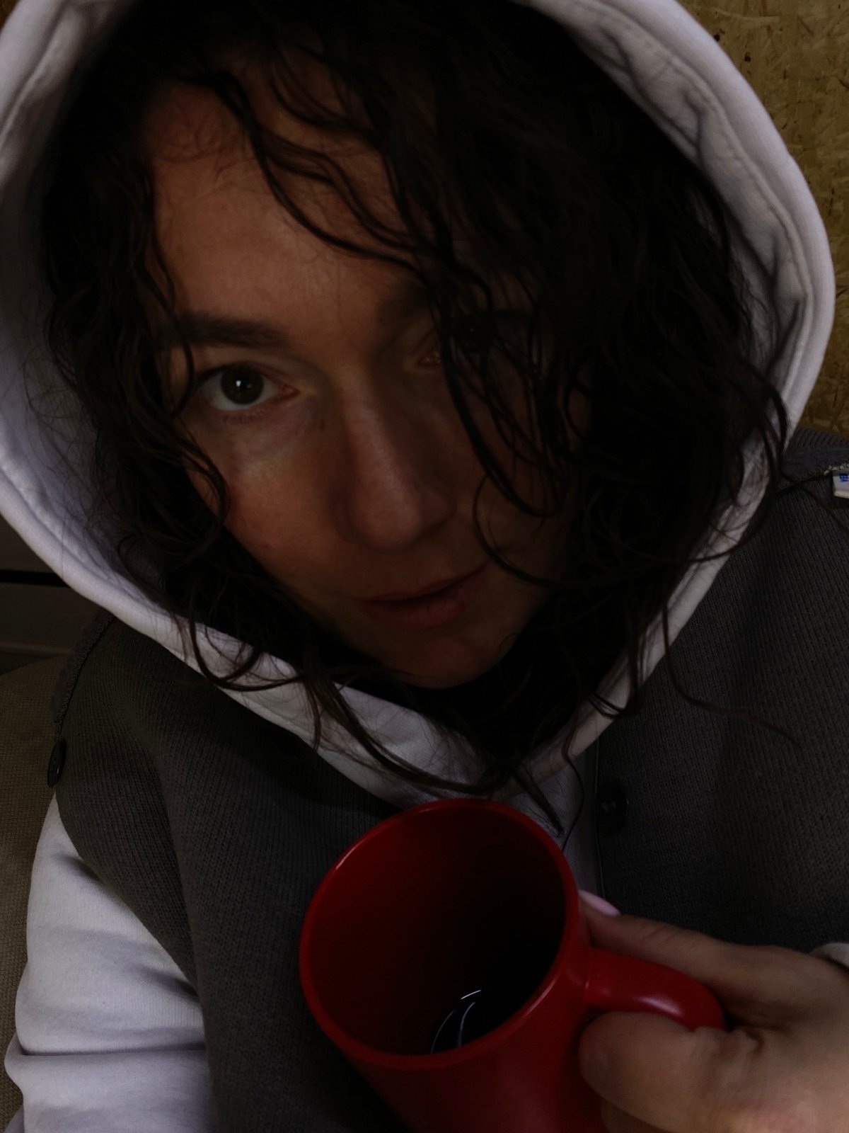Person with red mug photographed in Ol'khovskoye, Russia