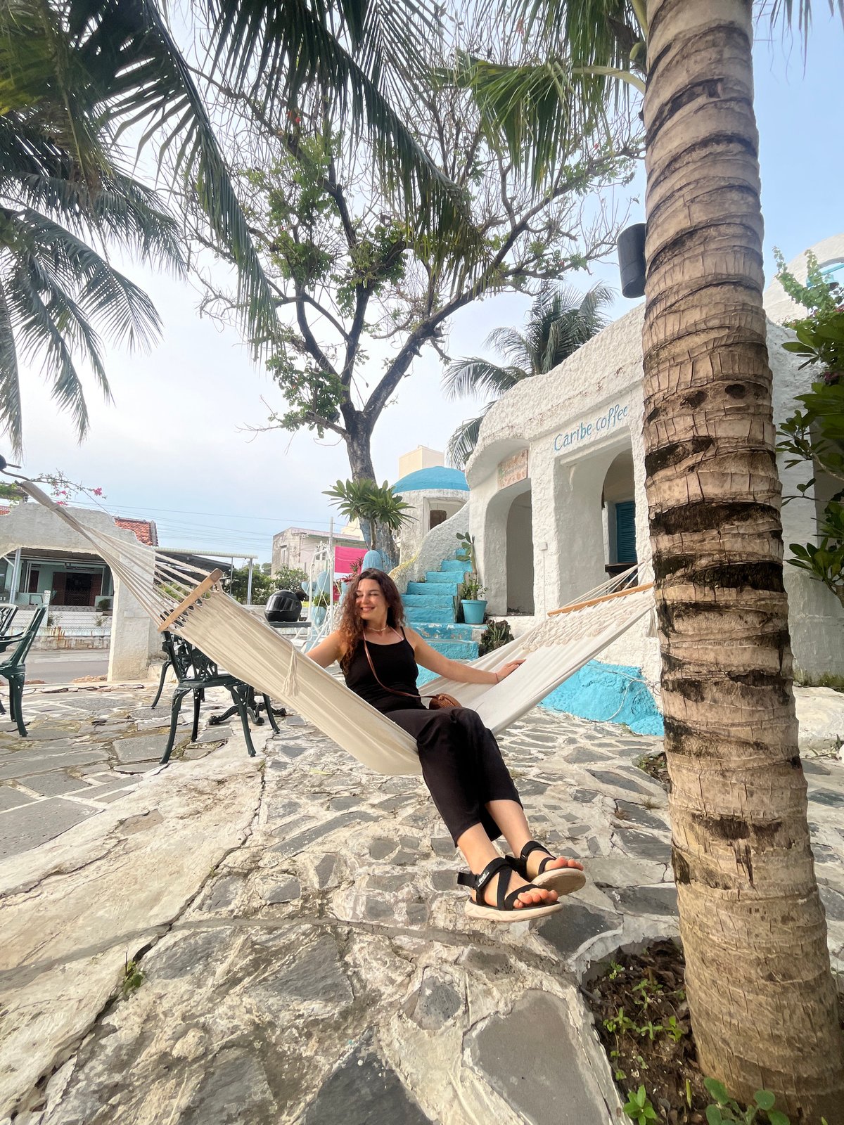 Posing around a blue-and-white café in coastal Vietnam