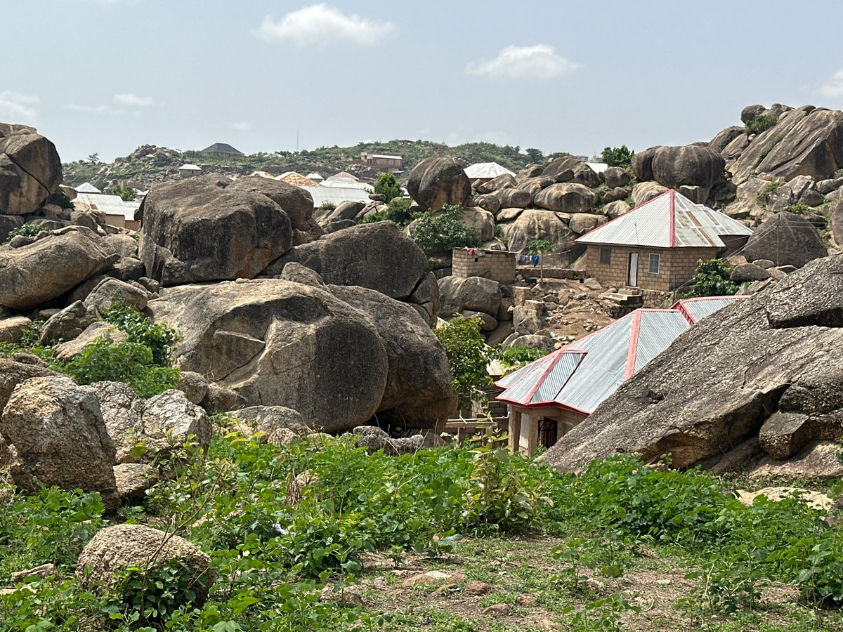 Jos Nigeria rocky landscape with granite boulders residential buildings documented