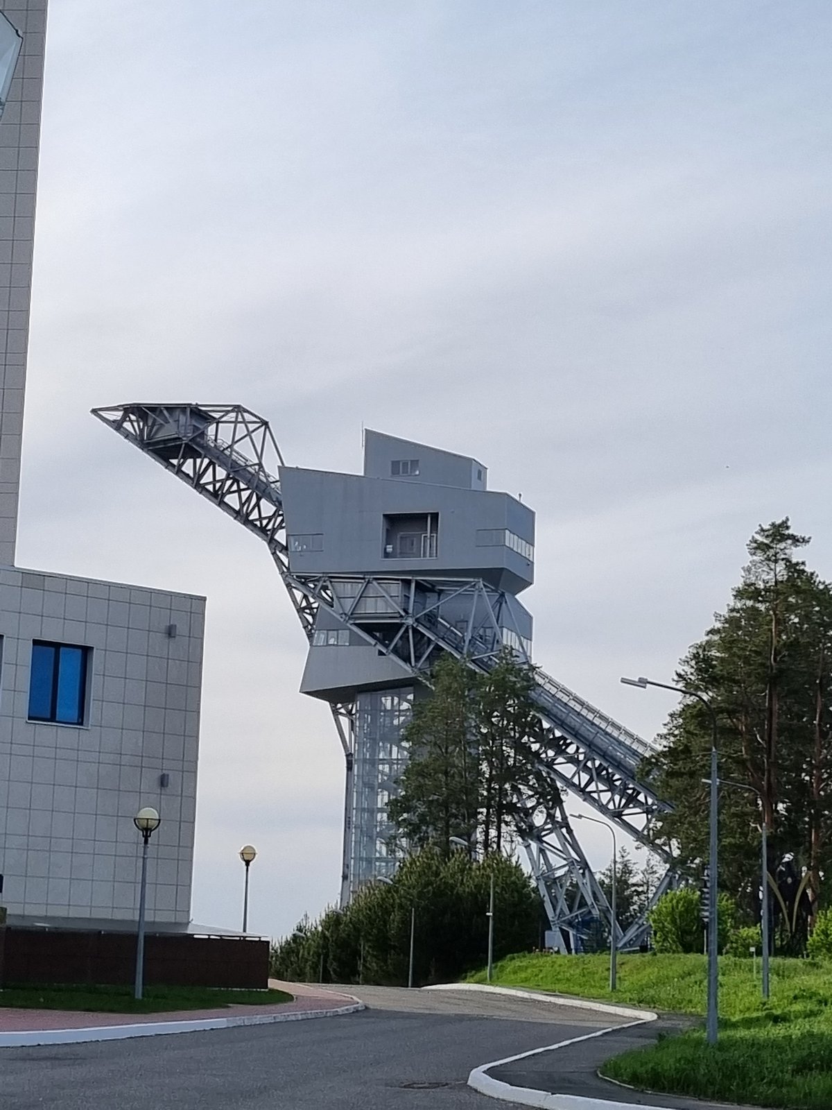 Tourist documents observation tower, buildings in Прикамский, Russia