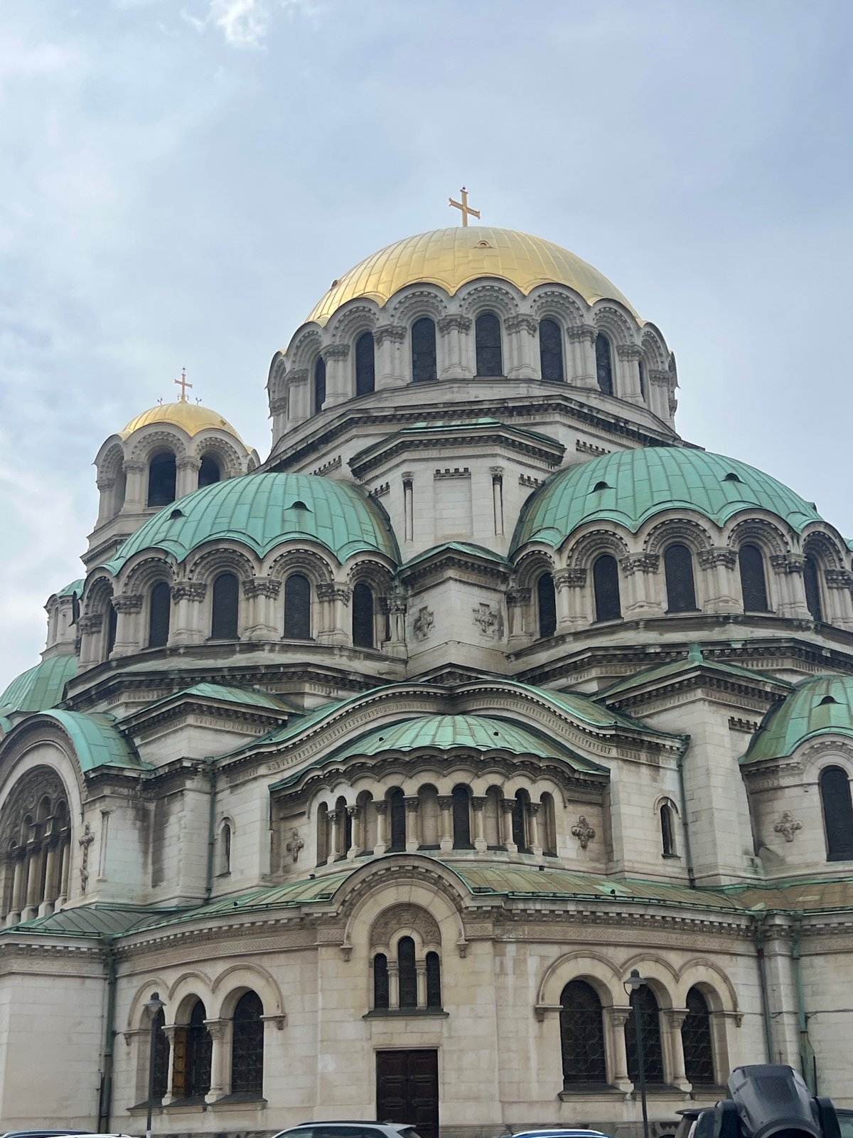 Tourist documents Sofia landmarks during afternoon walking tour