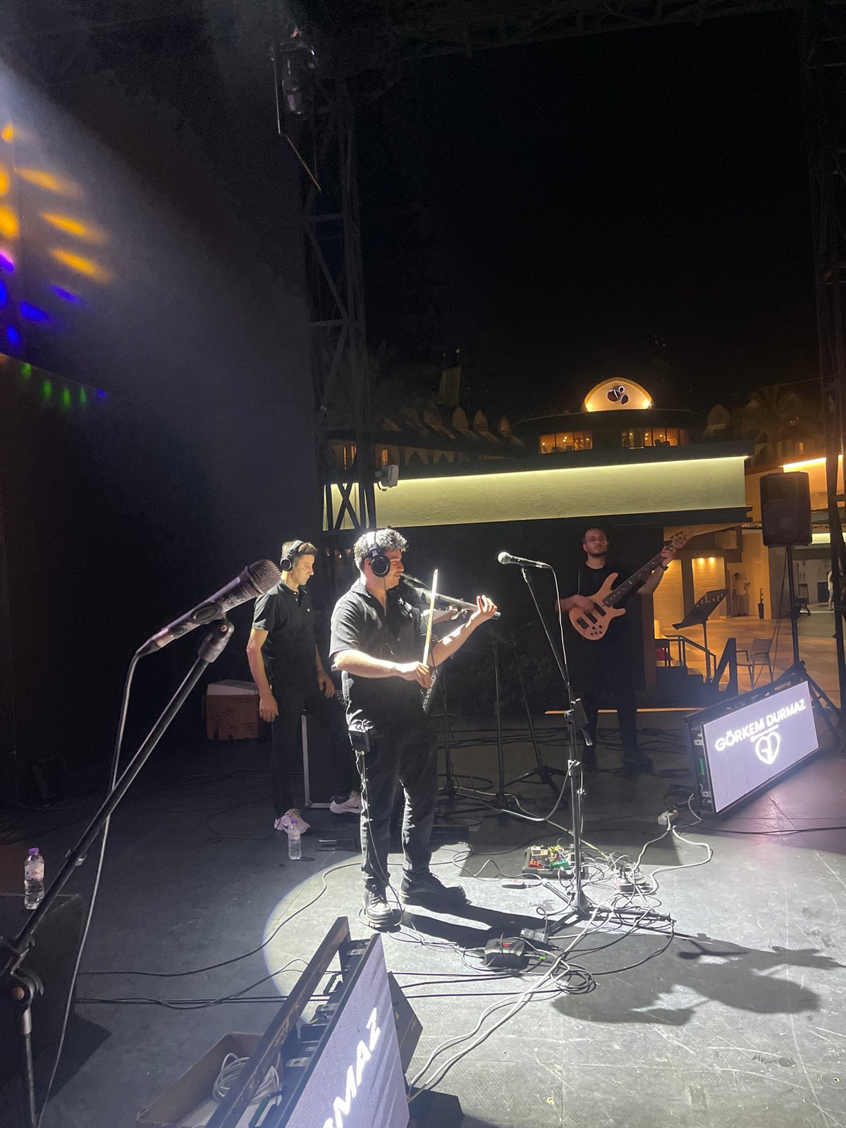 Live band plays outdoor stage at Kemer resort venue