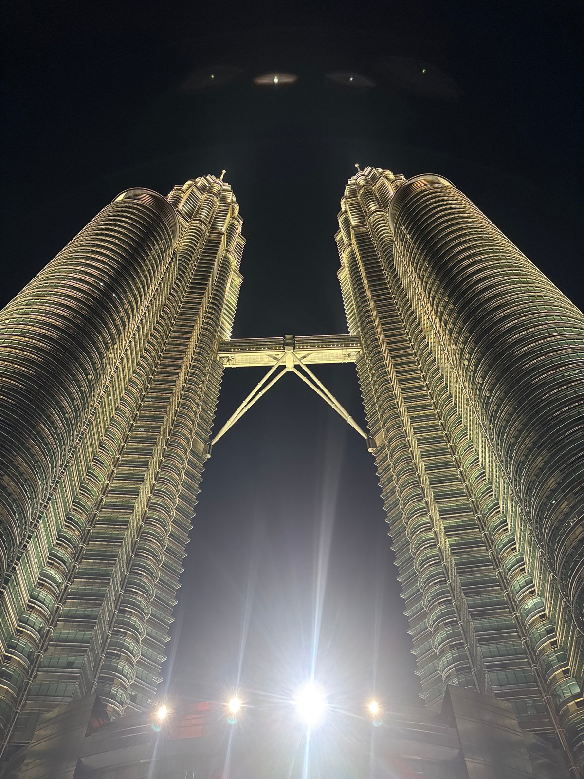 Evening documentation of Petronas Towers and KLCC area