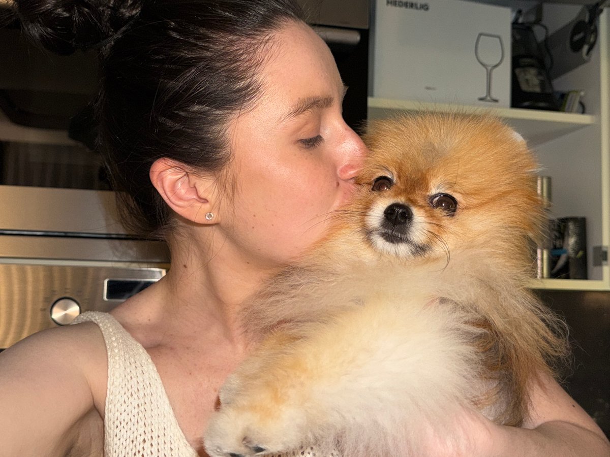 Woman shares quiet moments with pets in Khimki home