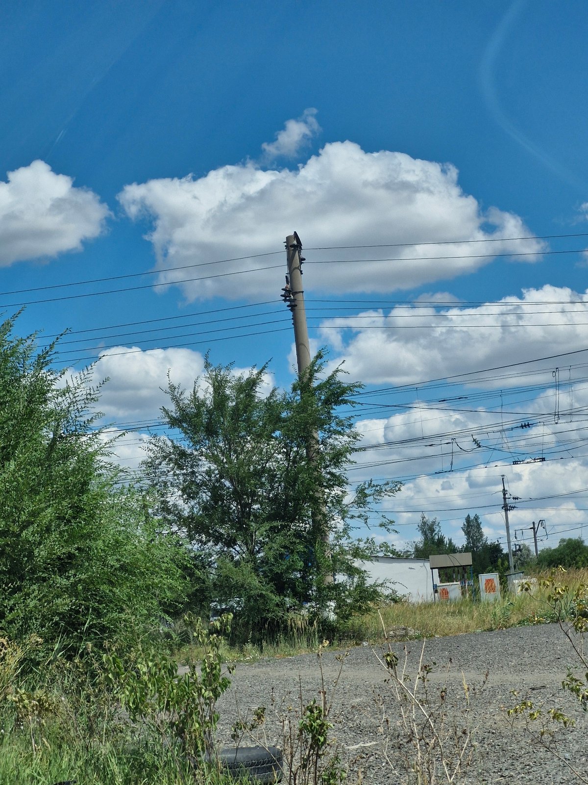 Street and rail scenes from a sunny morning in Astana