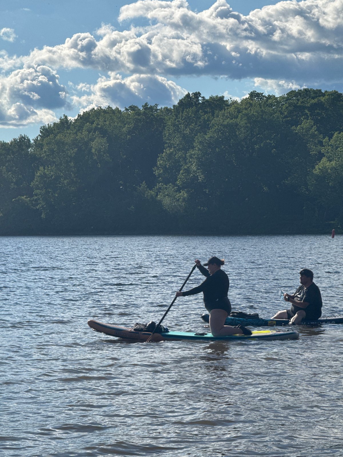 Paddleboarding on the Ottawa River on a clear summer evening
