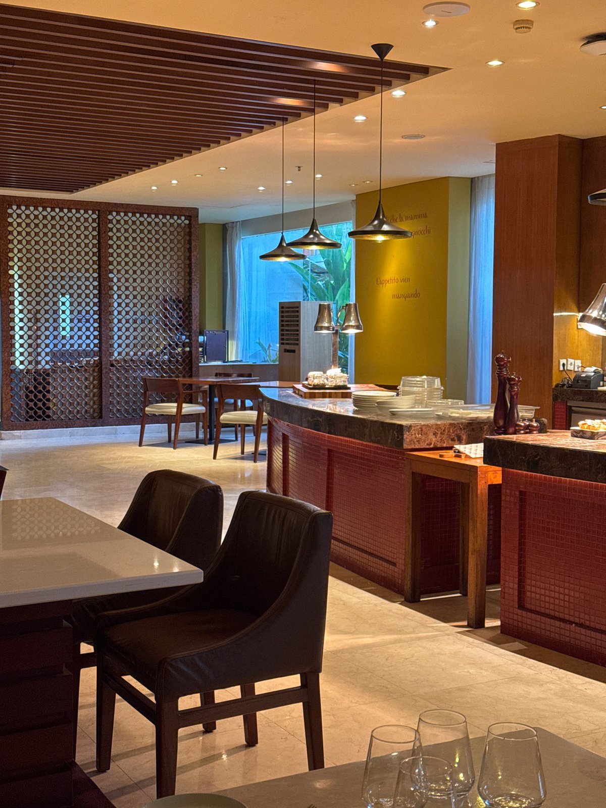 Inside a Kuta Selatan restaurant with a well-stocked wine rack