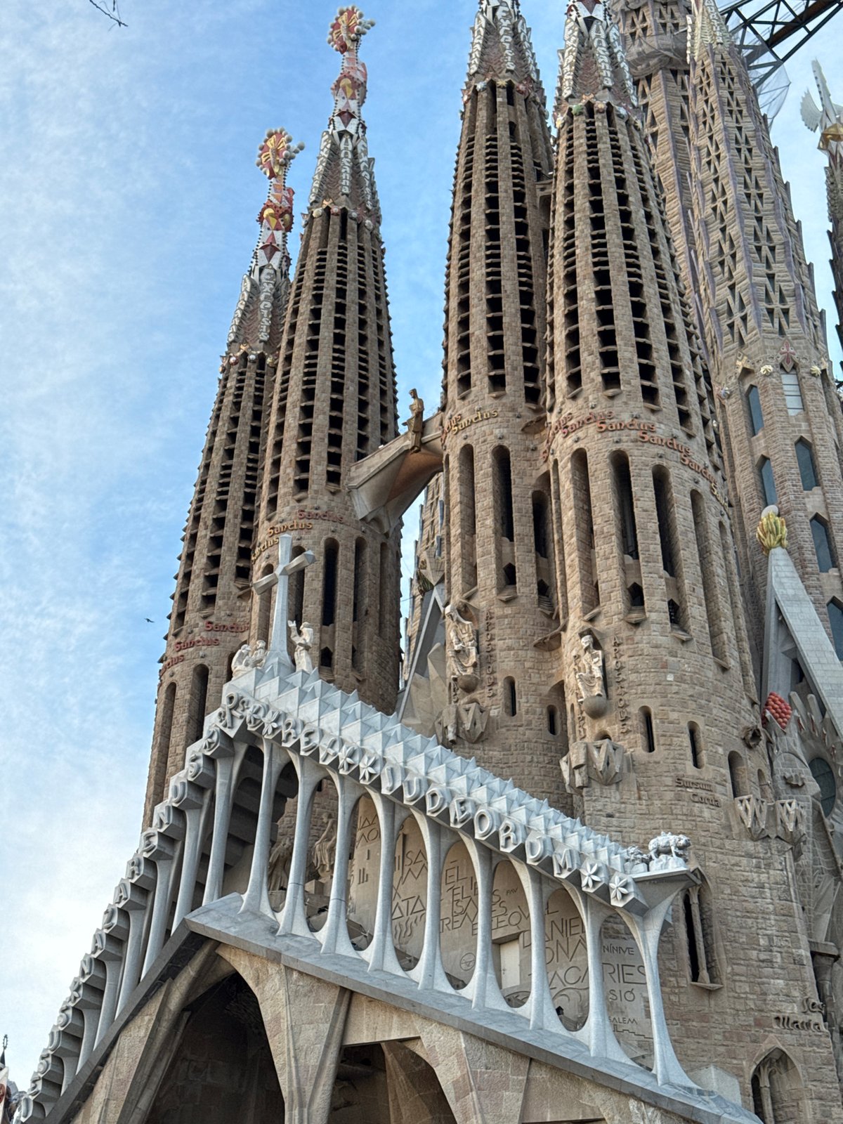Barcelona tourists capture Sagrada Familia and city scenes
