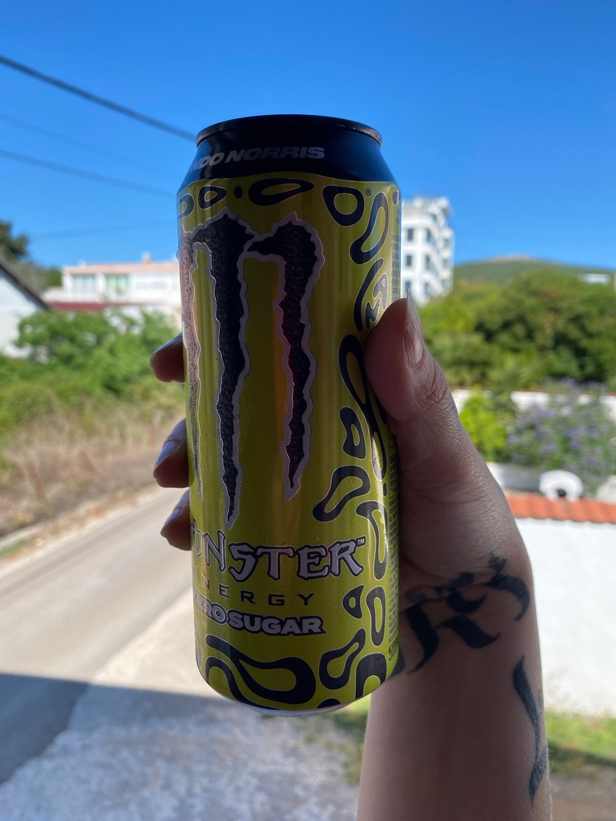 Person drinks Monster Energy in Kunje Montenegro residential area