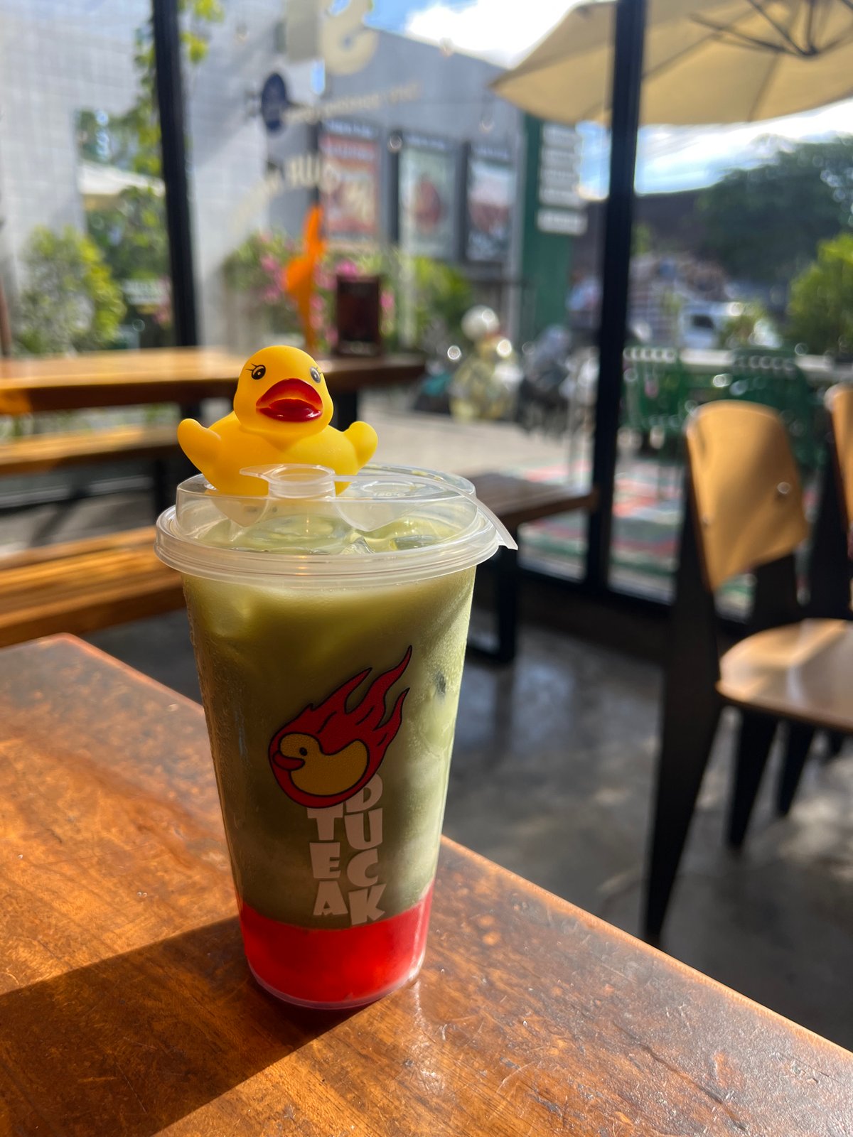 Morning breakfast documented at Kuta Selatan cafe with decorative duck