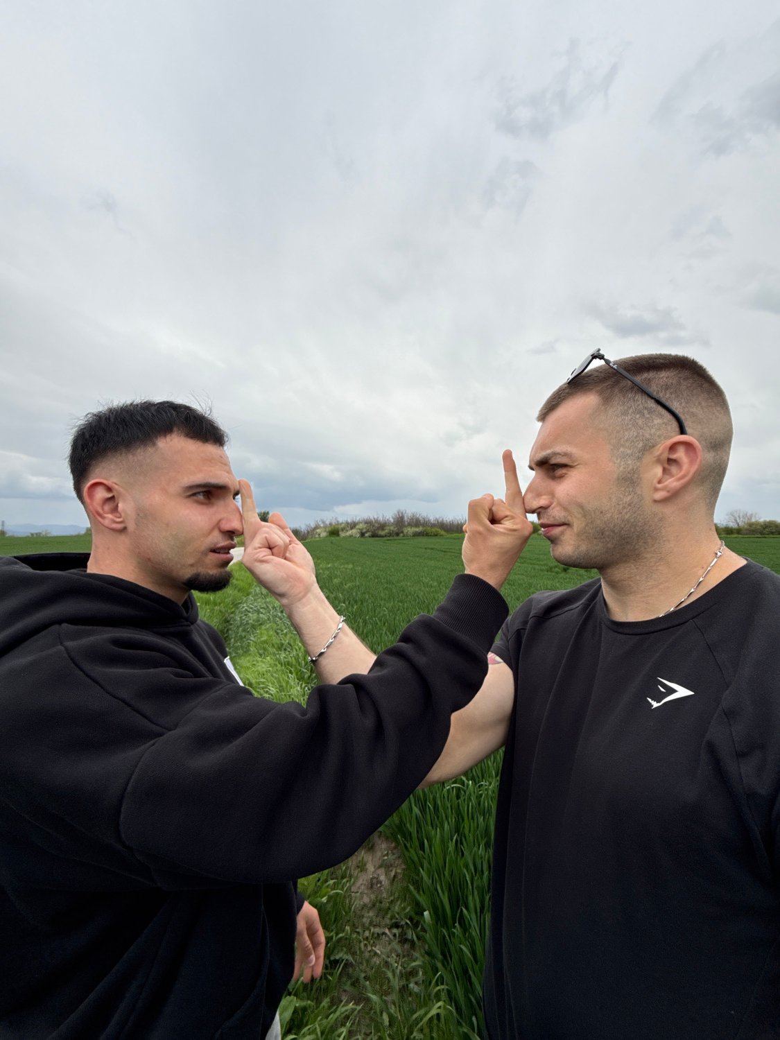 Young men play in field in Shumen, Bulgaria
