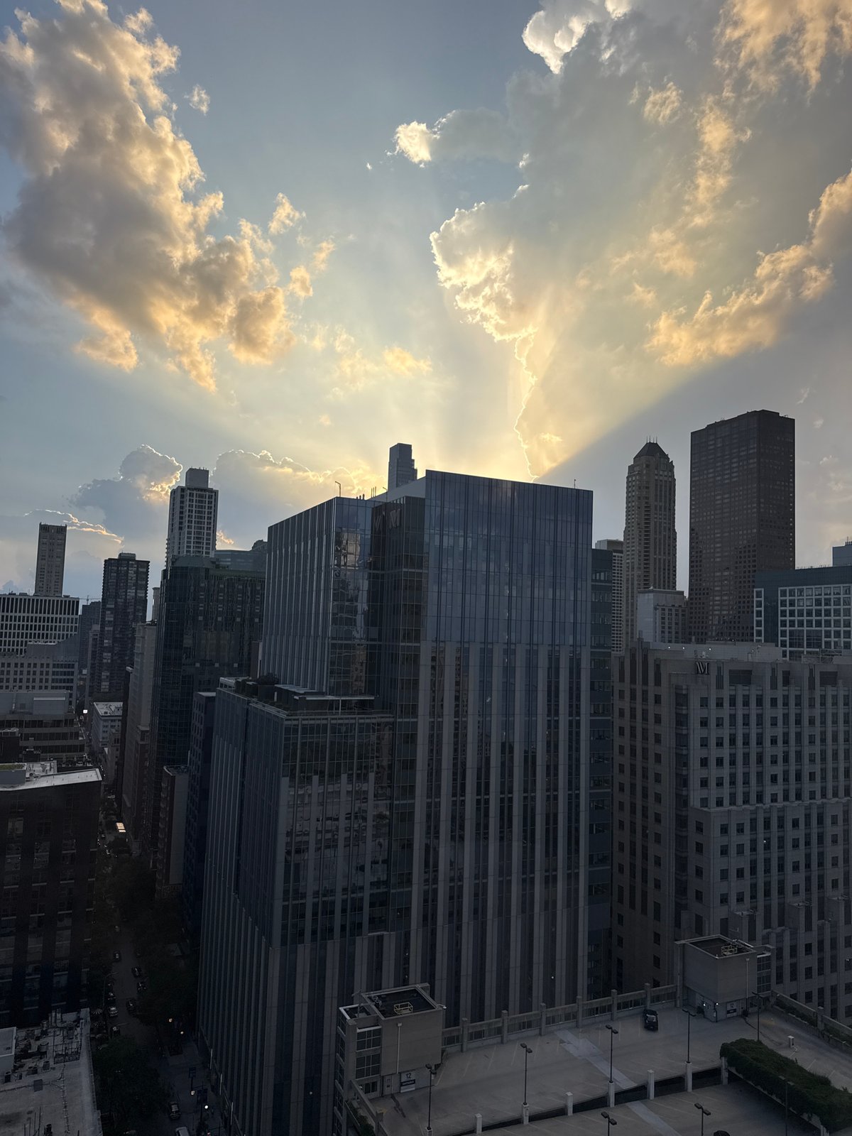 Chicago skyline glows at sunset on a busy July evening