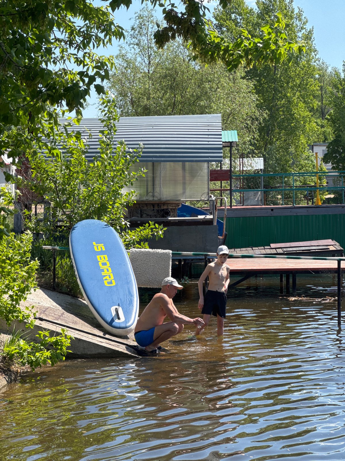 Morning riverside recreation captured along Kama River in Chaikovsky
