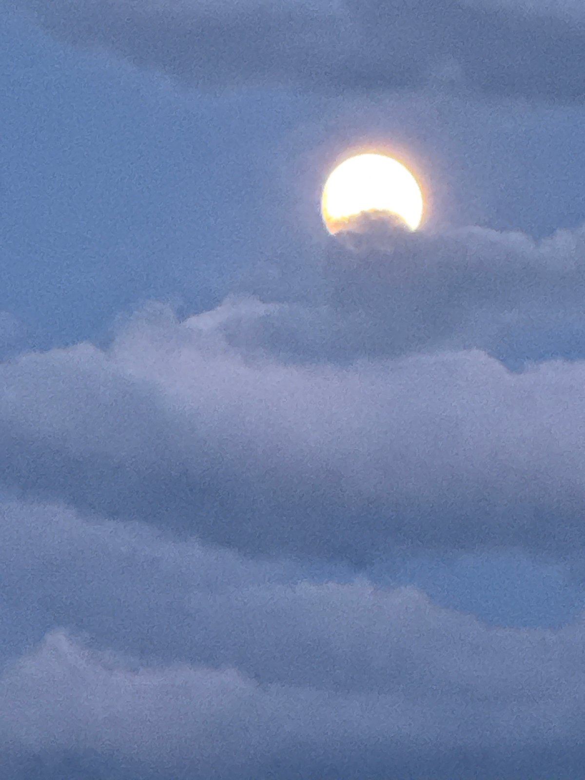 Celestial object observed through clouds in Kokshetau, Kazakhstan