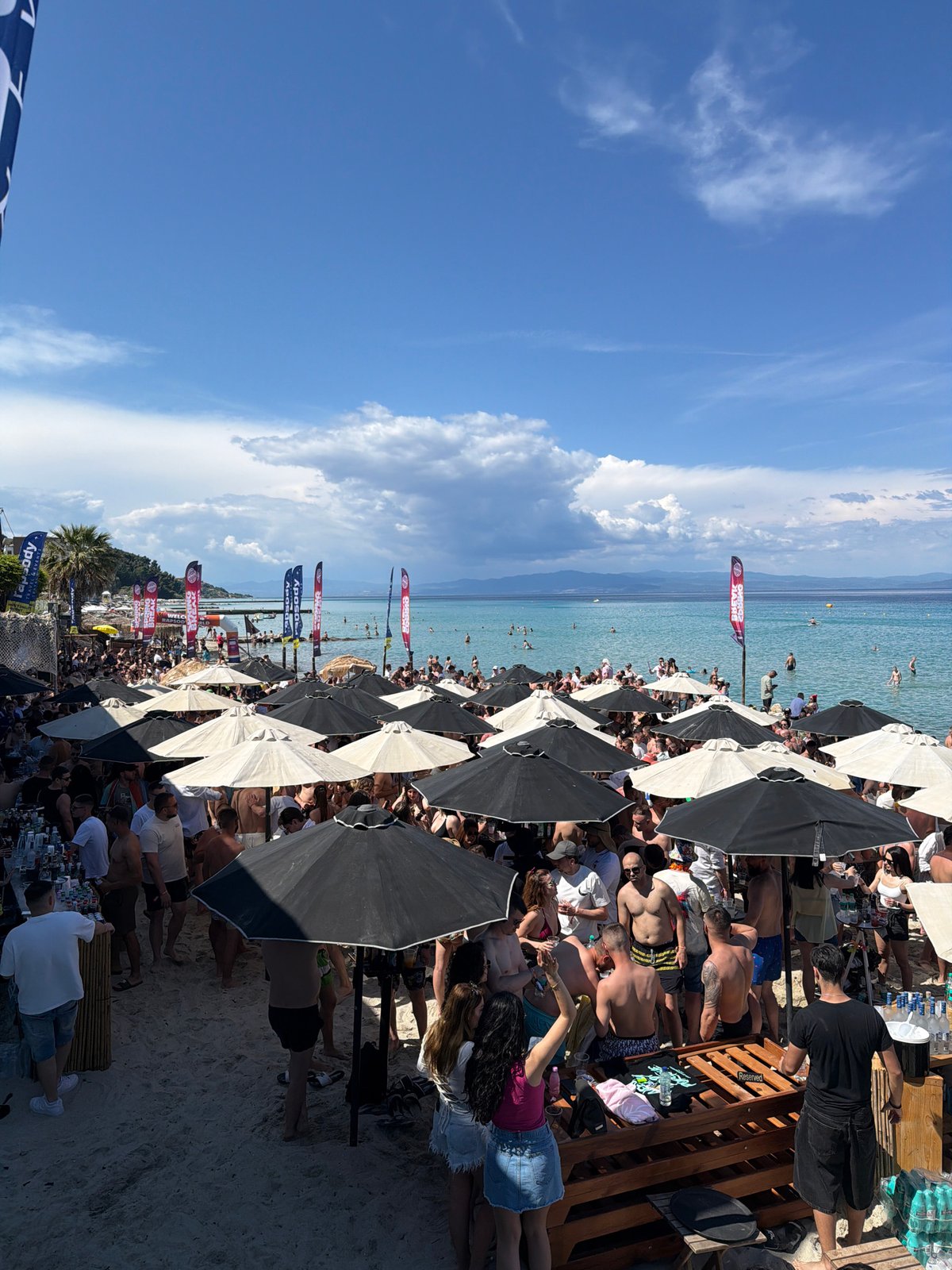 Busy beach day draws crowds for swimming and sunbathing