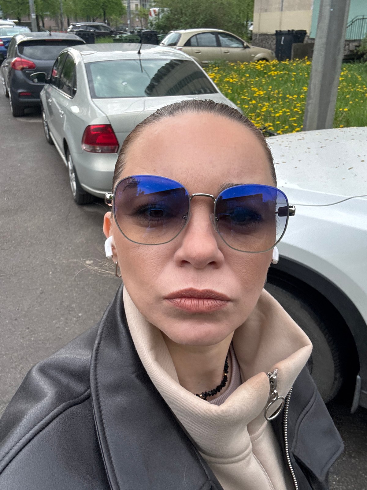 Woman takes morning selfie on Saint Petersburg street