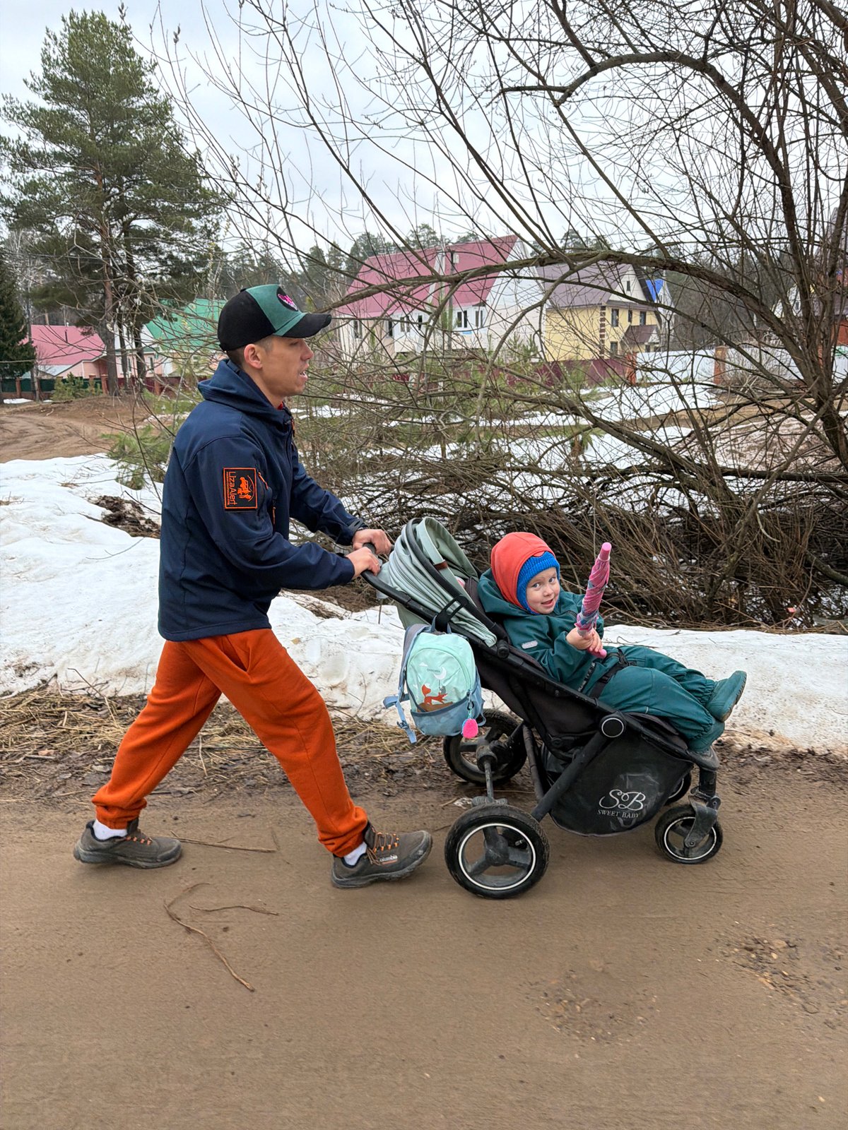 Family outing documented in Chaikovsky woods with selfies, stroller walks