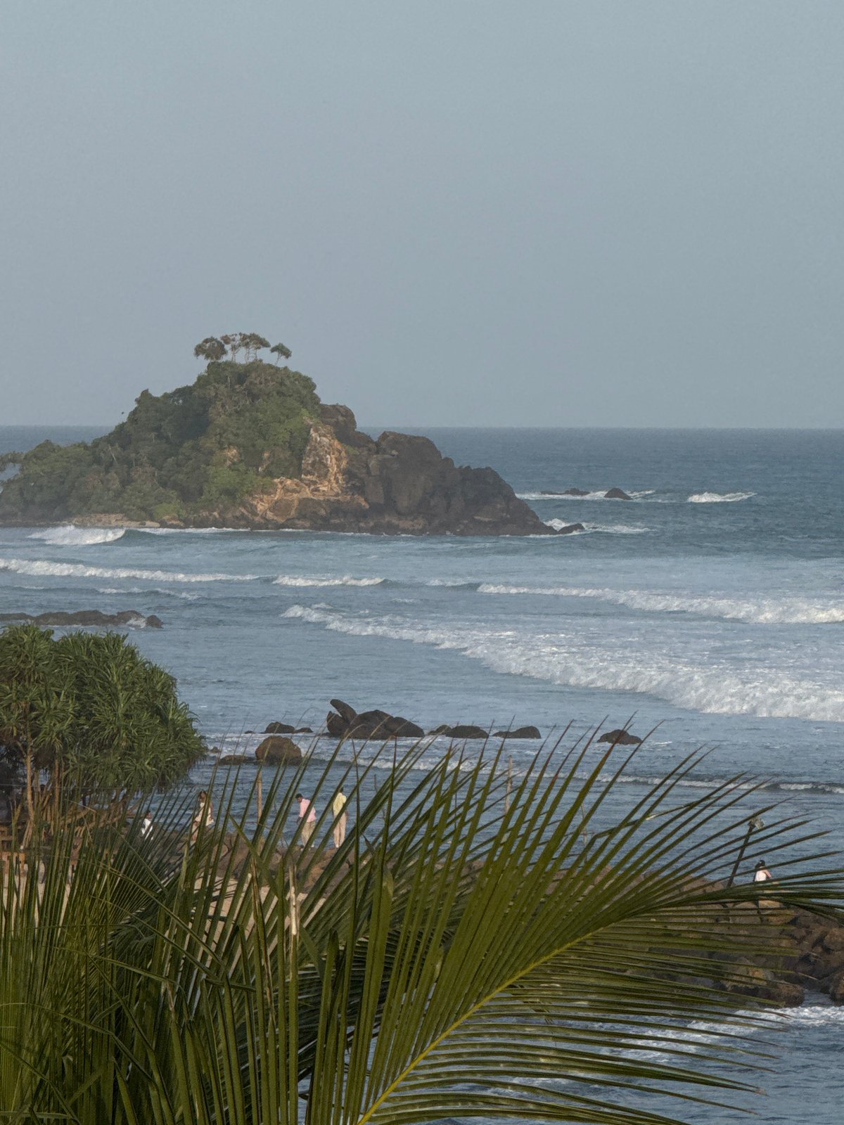 Palm-lined coast and rocky islands, Goviyapana, Sri Lanka