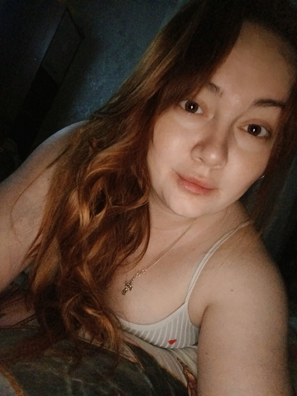 Woman takes selfies at home in Chaikovsky, Russia
