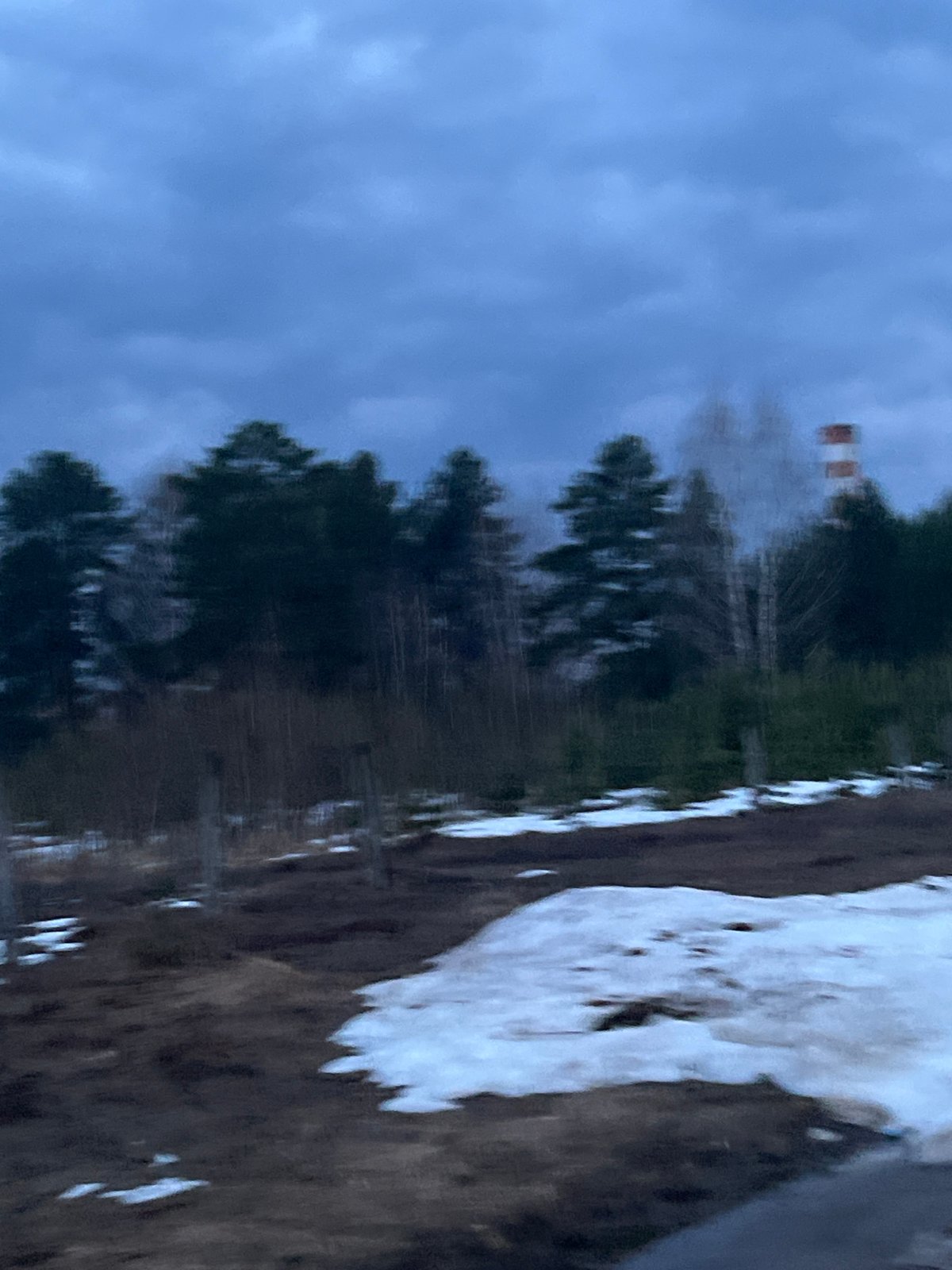 Daily life documented across Markovskii, Russia during spring afternoon